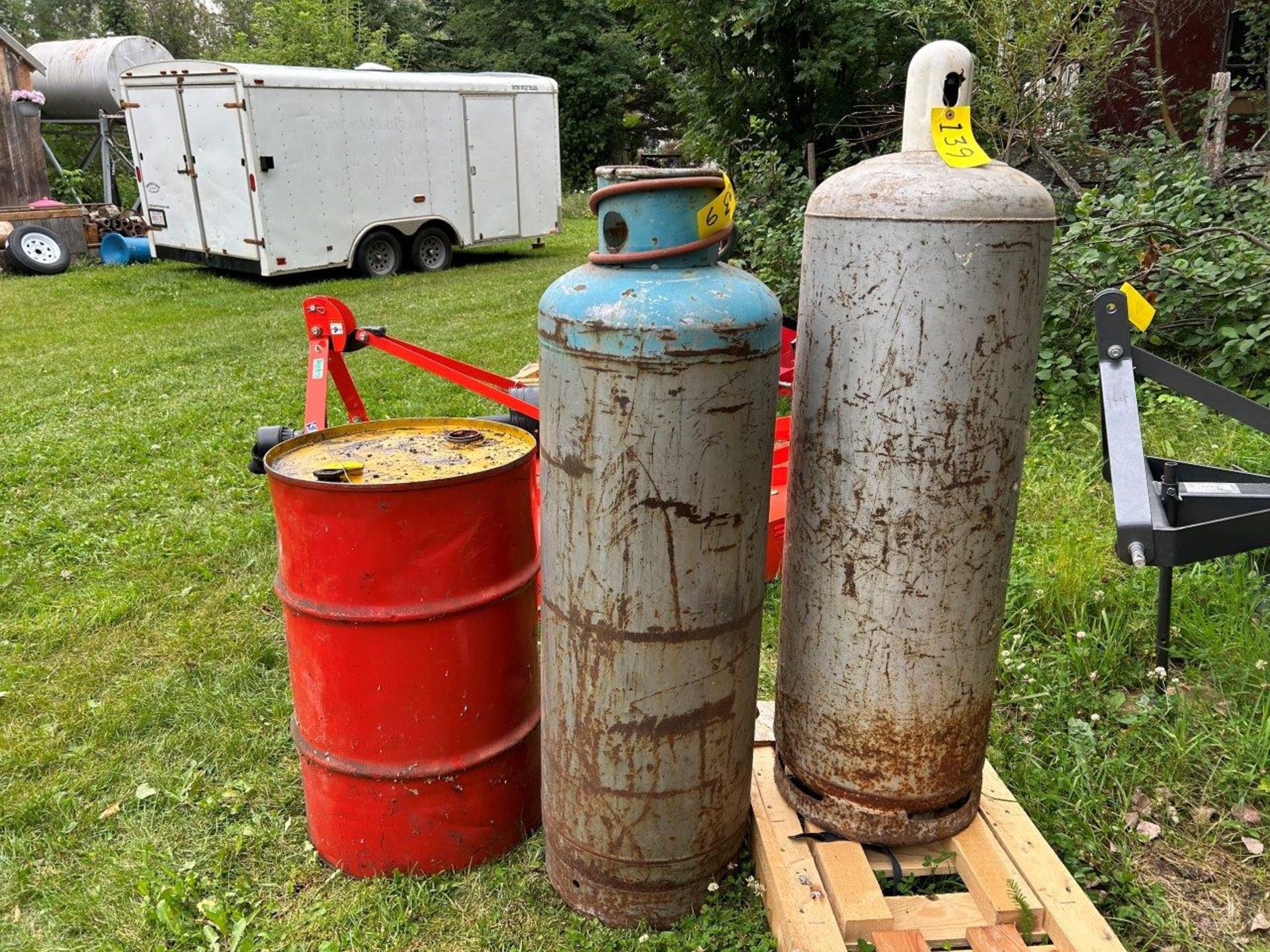 2 - USED 100LB PROPANE CYLINDERS (1 WITH TIGER TORCH)