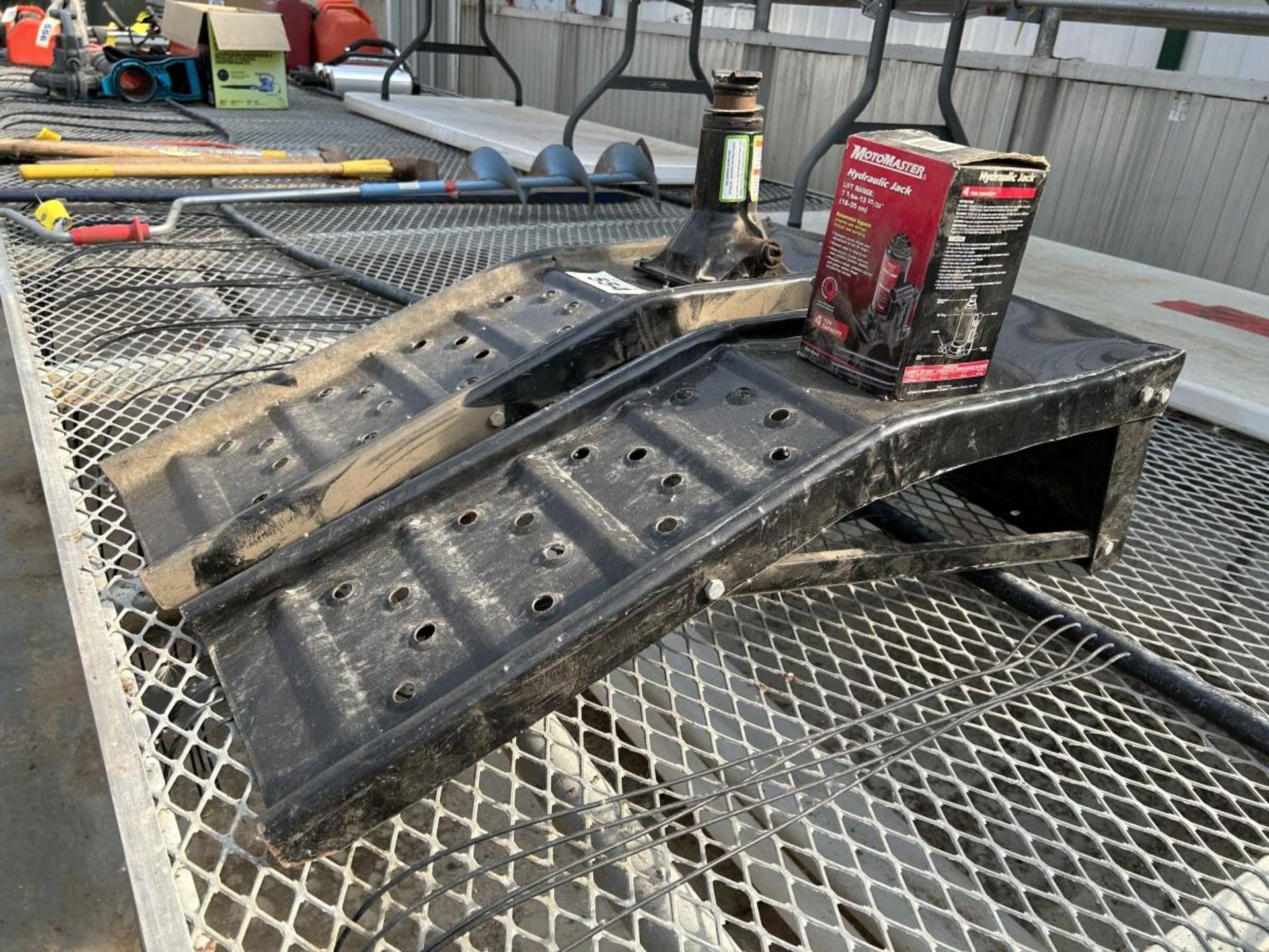 PAIR OF METAL SERVICE RAMPS AND 2-HYD. BOTTLE JACKS