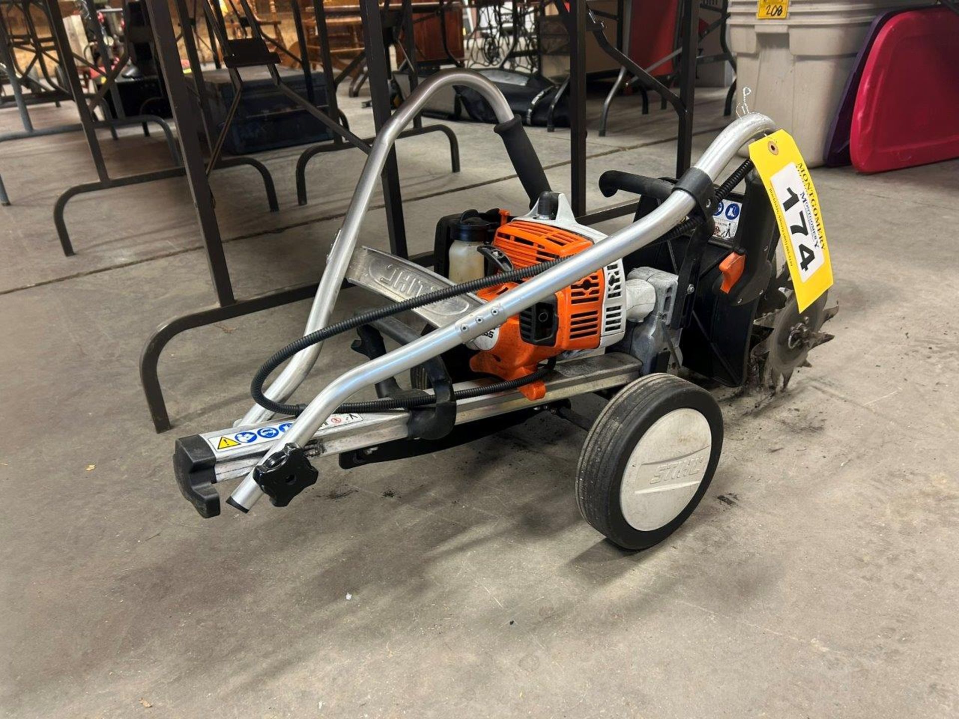 STIHL GAS POWERED TILLER W/ WHEEL KIT