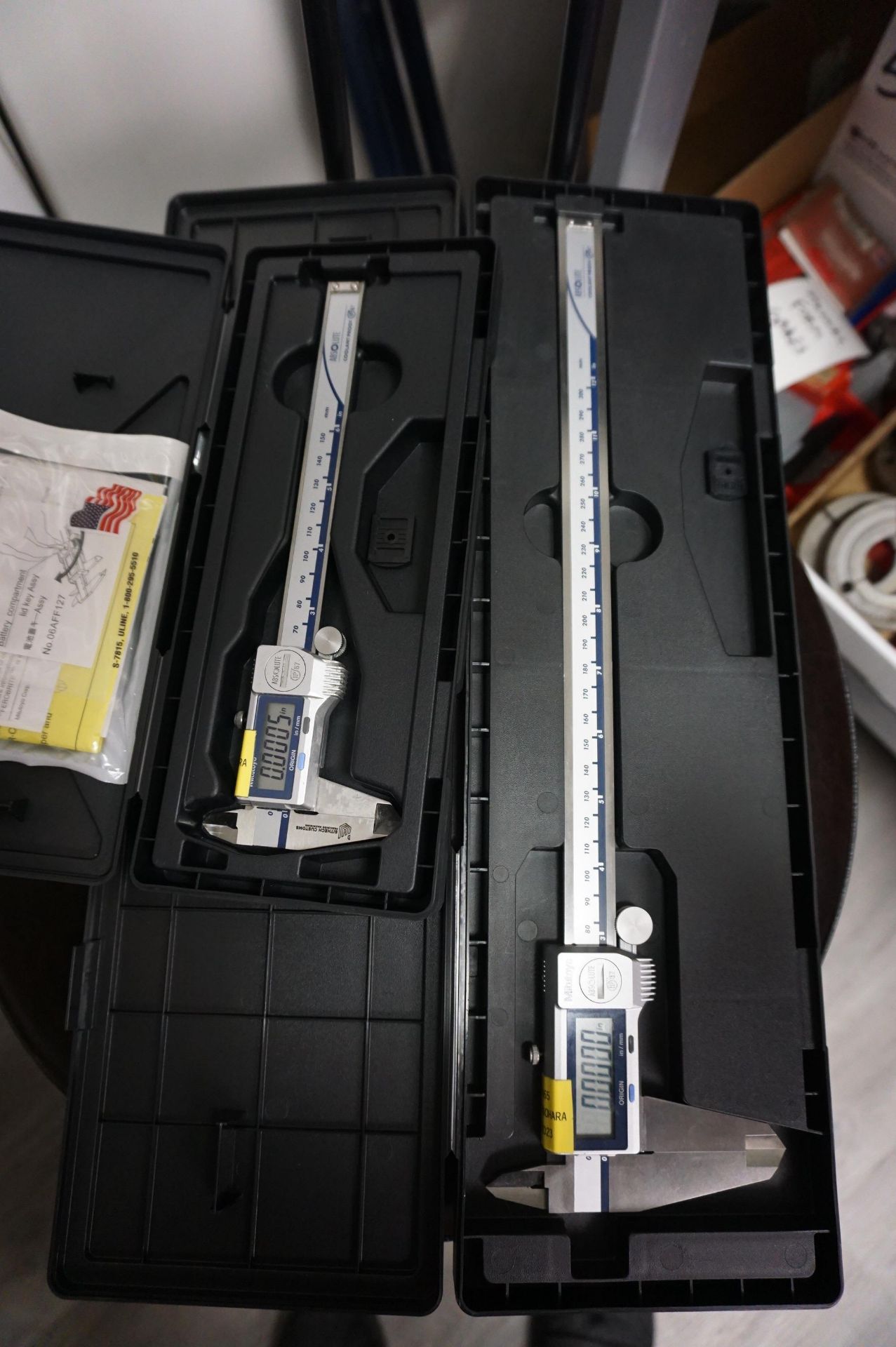 LOT TO INCLUDE: (1) MITUTOYO ABSOLUTE COOLANT PROOF DIGITAL CALIPER 12", (1) MITUTOYO ABSOLUTE