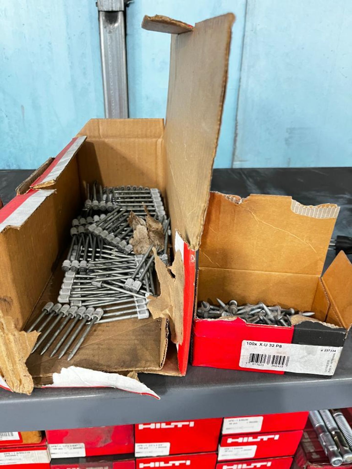 Shelf of Hilti Concrete Hardware; Shot Fasteners, Flat Split Bolts, Screw Shaft Concrete Bolts, & Mo - Image 2 of 8