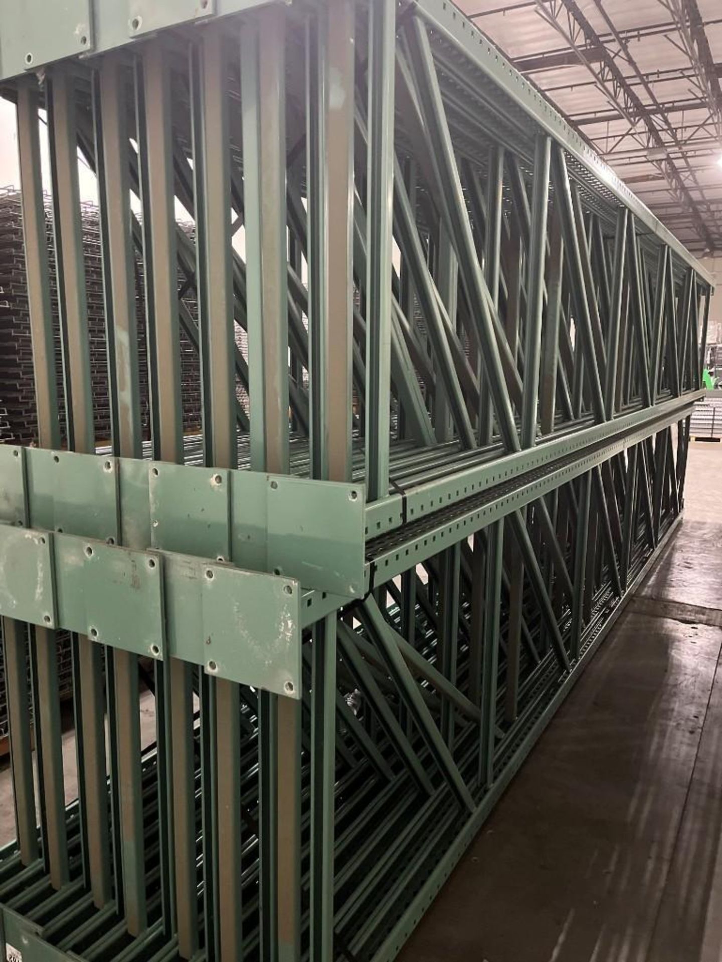 (23X) 42" Deep X 22' Tall Ridg-U-Rak Teardrop Pallet Rack Uprights w/ 3" X 3" Columns, Seismic Foot