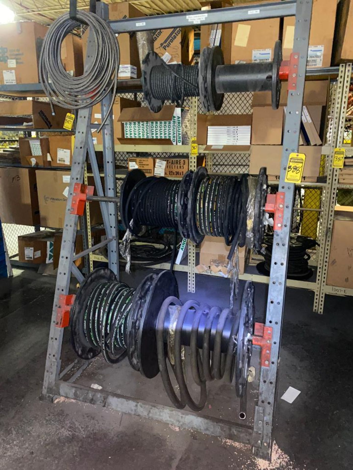 Rack w/ Spools of Goodyear Extended Life Hoses