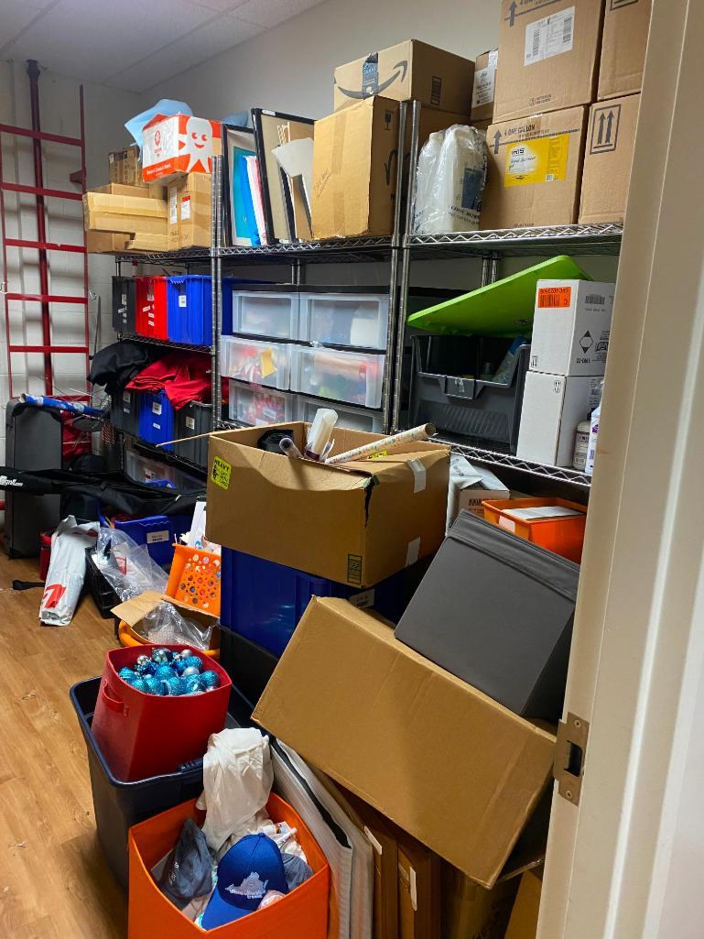 Content of Office Supply Closet: Shelving, Decorations, Desk, & Bins