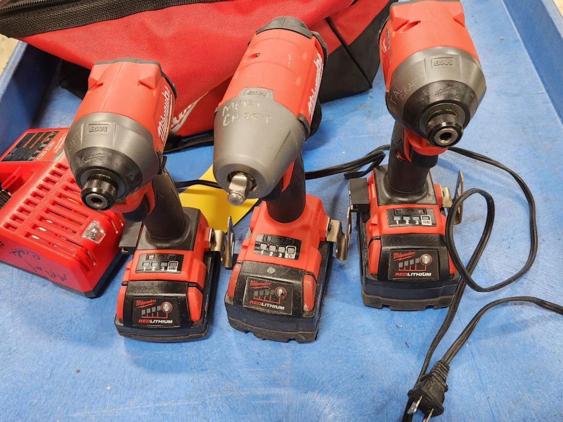 Milwaukee M18 Fuel Cordless Impact Combo Kit, 3/8" Impact Wrench, Model 2754-20, (2) 1/4" Impact Dri