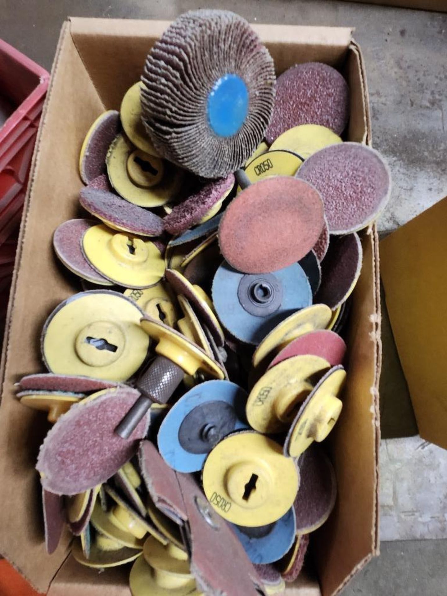 Box of Sanding Discs, Adapters, & Grinding Wheels
