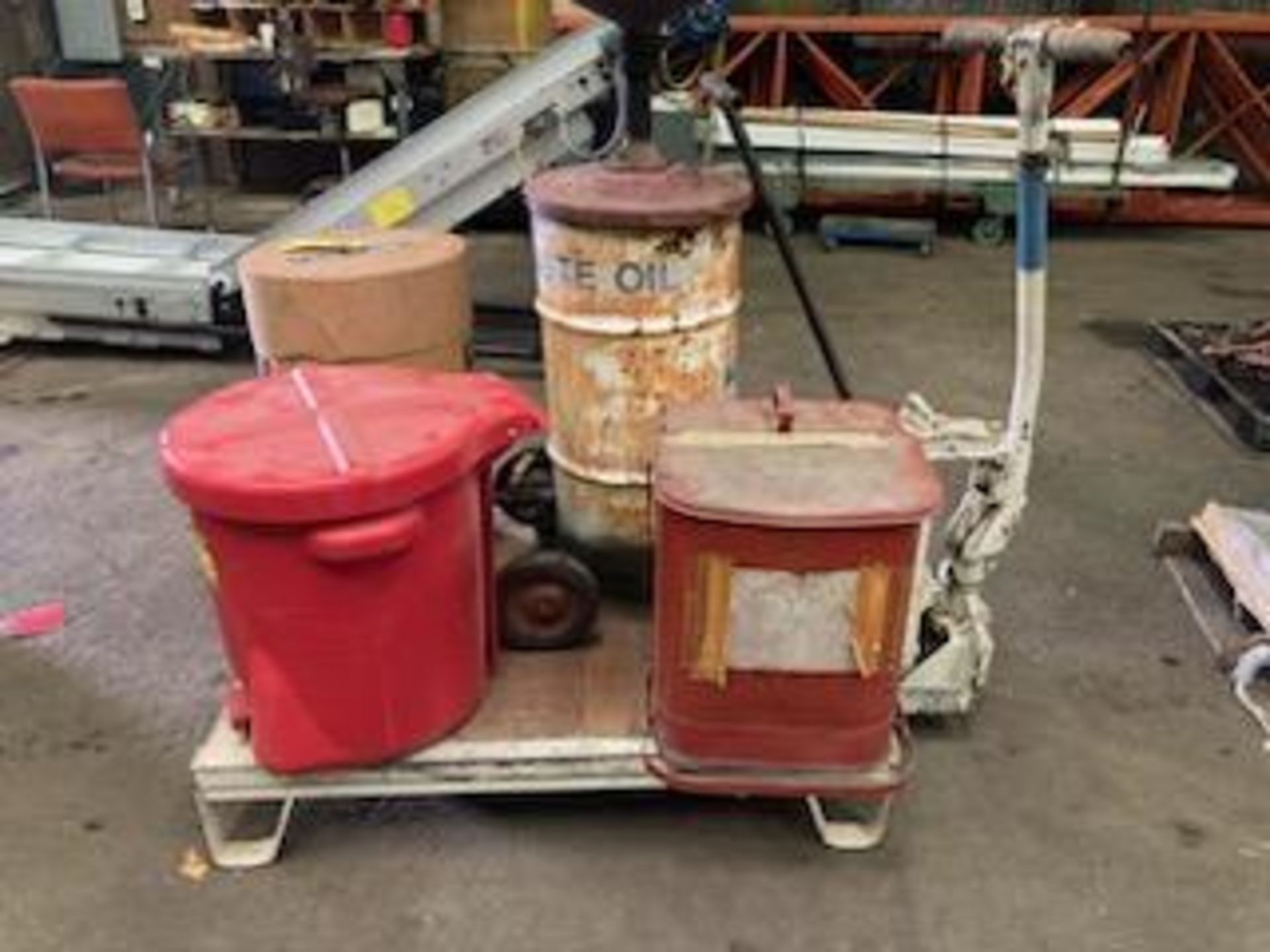 Waste Oil Containers on HD Platform Jack (Location: 279 Burrows St., Rochester, NY 14606)