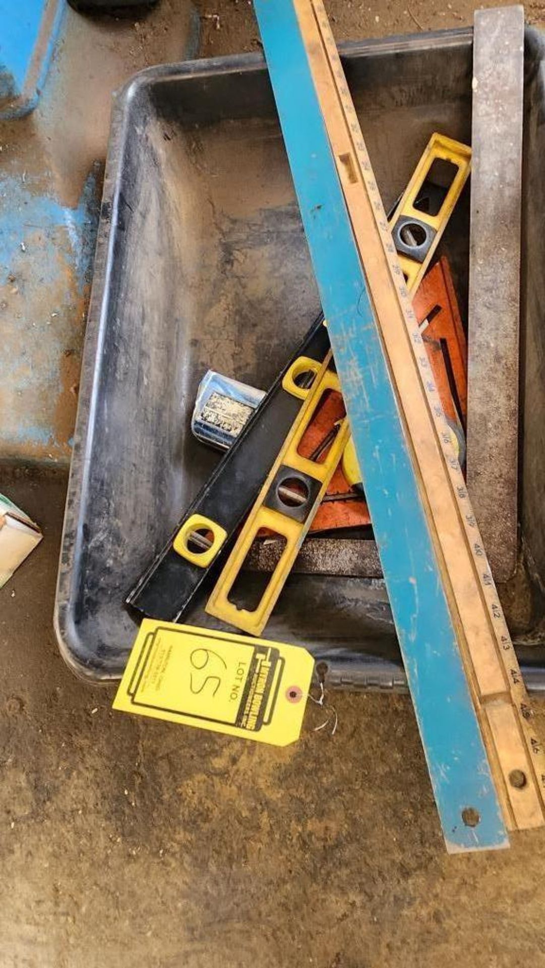 Bin of Assorted Measurement Tools, Tape Measures, Speed Squares, Framing Square, 24" Levels