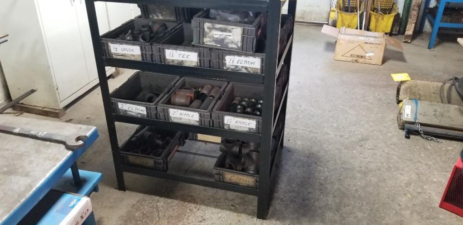 Steel Rack w/ Content of Assorted Pipe Fittings