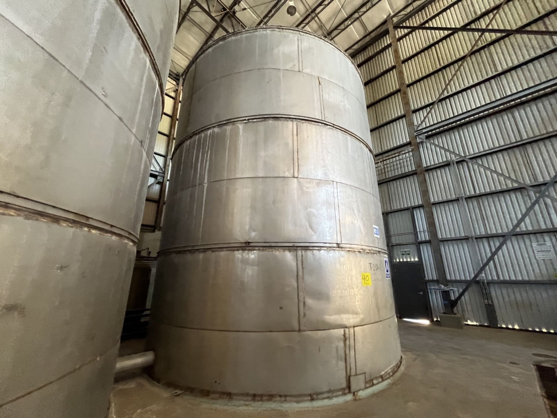 Stainless steel storage tank with a capacity of 192,163 liters, measuring approximately 6 meters in - Image 4 of 8