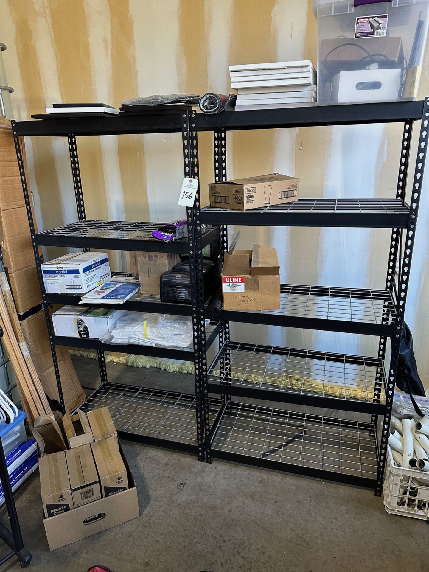 Lot of (2) Teardrop Shelving Units with Contents | Rig Fee $25