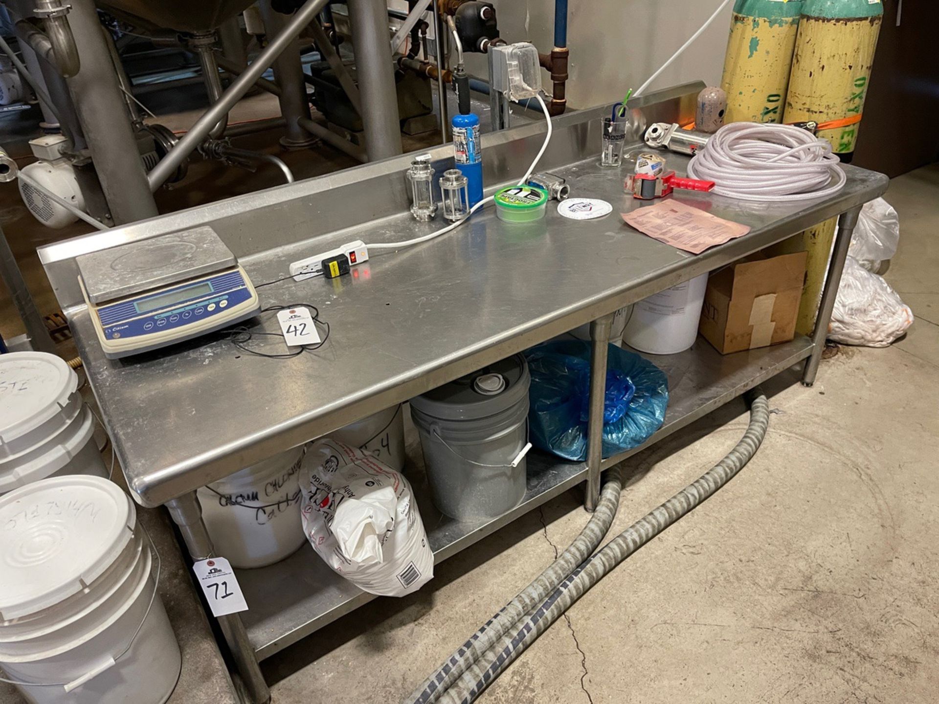 Stainless Steel Table with Shelf, Approx. 30" x 7' (No Contents) | Rig Fee $50