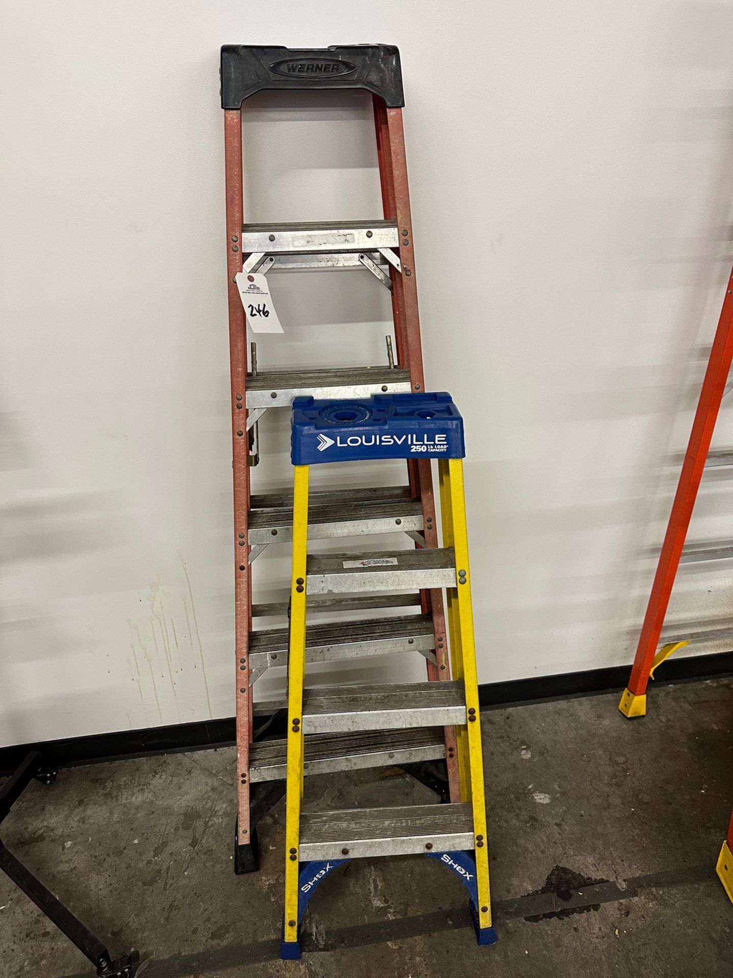 Lot of (1) Werner 6' Fiberglass Step Ladder with 300LB. Capacity and (1) Louisville | Rig Fee $50