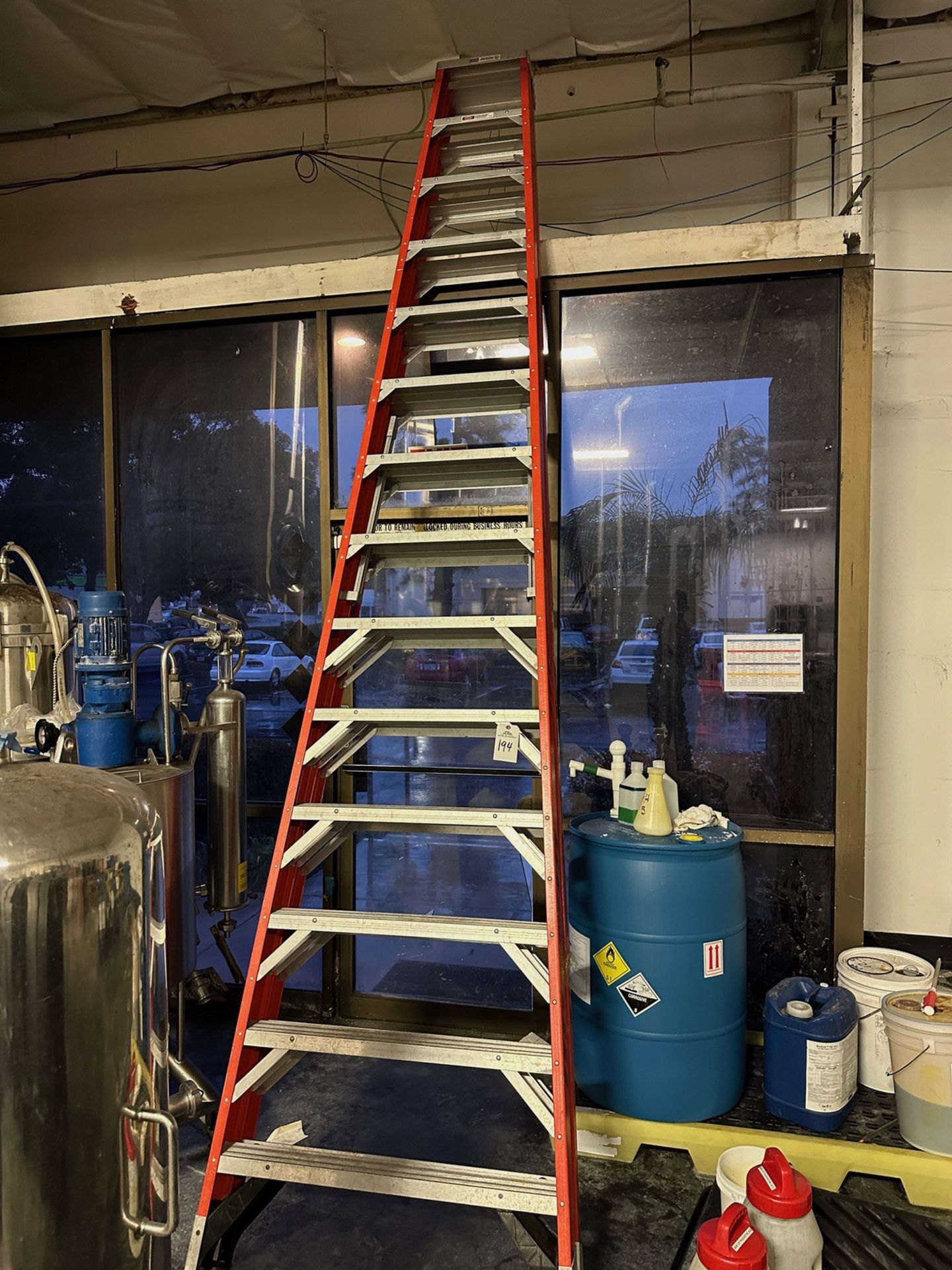 Lot of (1) Werner 14' Fiberglass Step Ladder and (1) Werner Step Ladder | Rig Fee $35