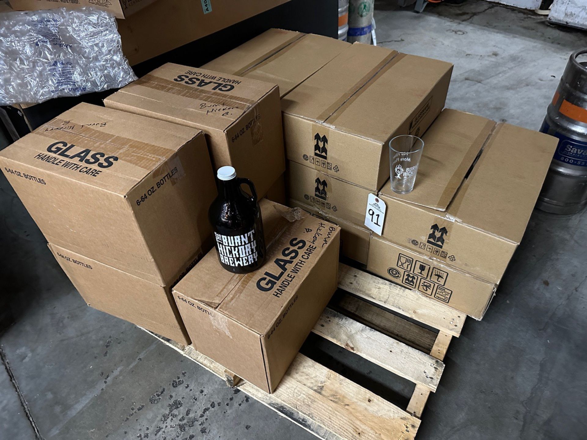 Lot of (5) Cases Branded Growlers and (8) Cases Branded Pints | Rig Fee $50