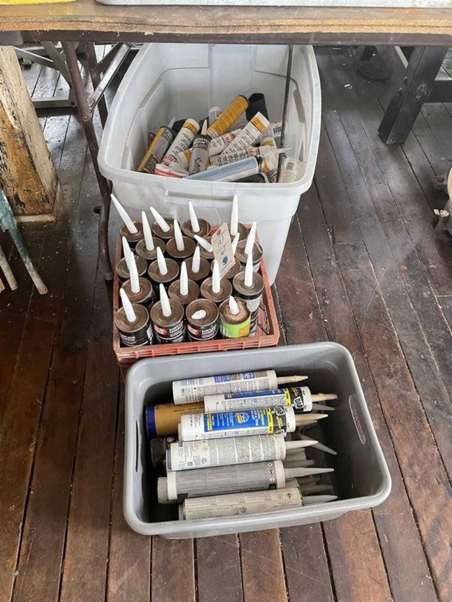 {LOT} Asst. Calk and Adhesive