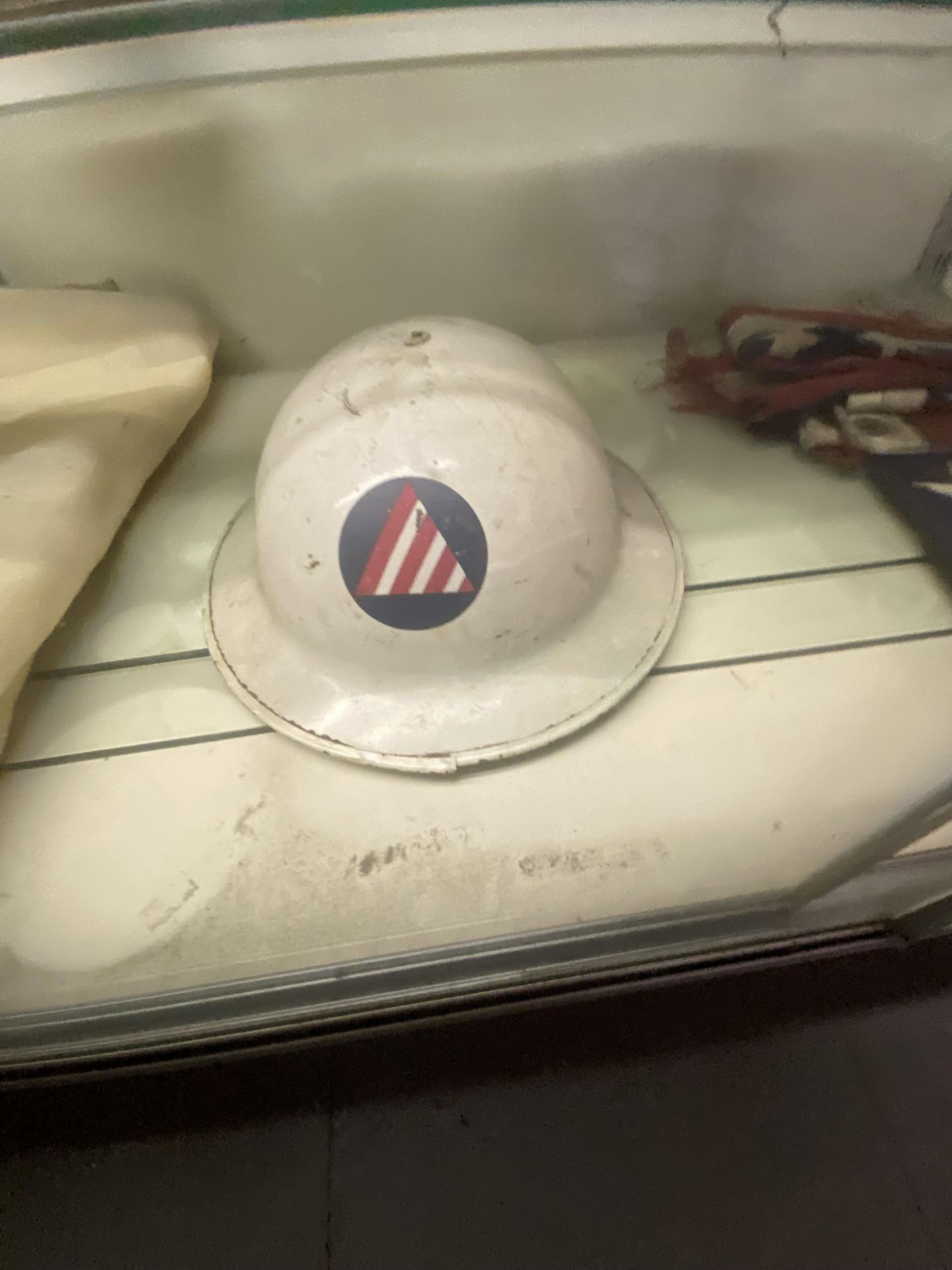 {LOT} On 1 Shelf w/(2) Asst. Helmets, Old Navy Blanket, And (2) Asst. Gauges - Image 5 of 6