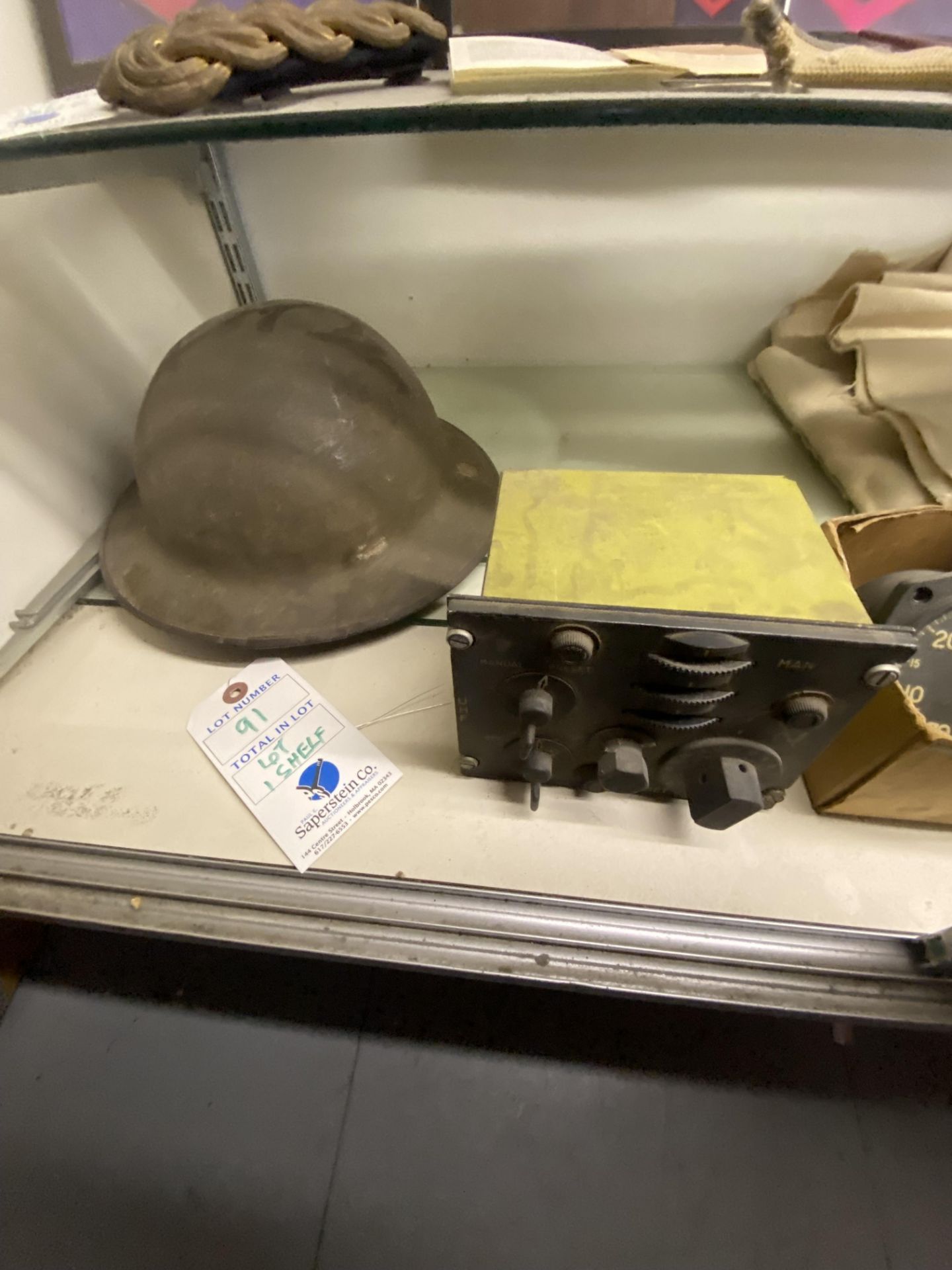 {LOT} On 1 Shelf w/(2) Asst. Helmets, Old Navy Blanket, And (2) Asst. Gauges - Image 2 of 6