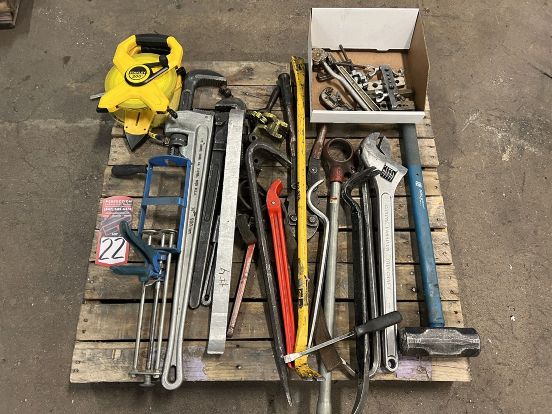 Lot Comprising Pipe Wrenches, Adjustable Wrench, Tape Measures, Strap Wrenches, Pry Bar and Mallott