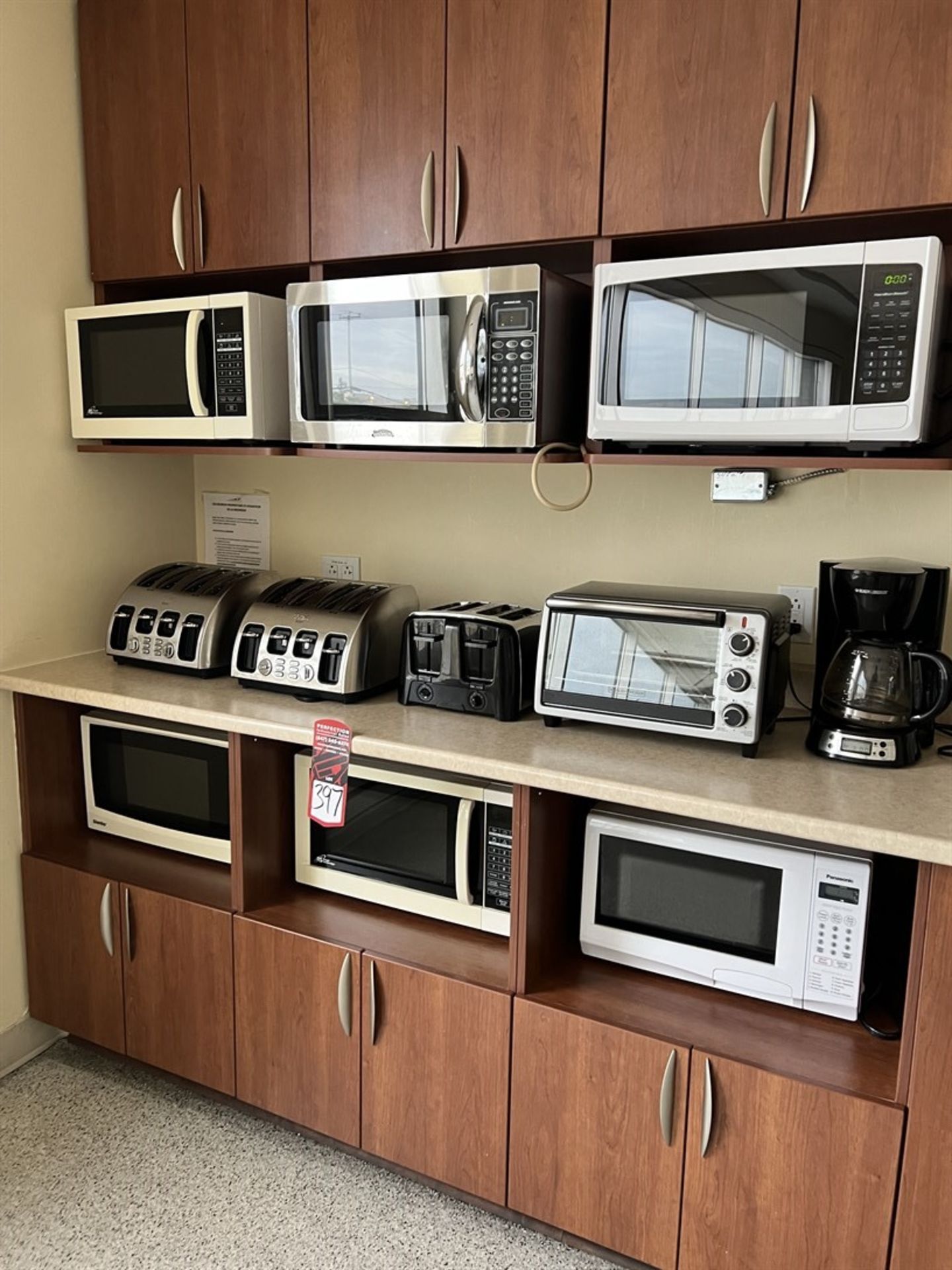 Small Break Room Kitchen Appliances Including Toaster, Microwaves, Coffee Pot and Toaster Ovens