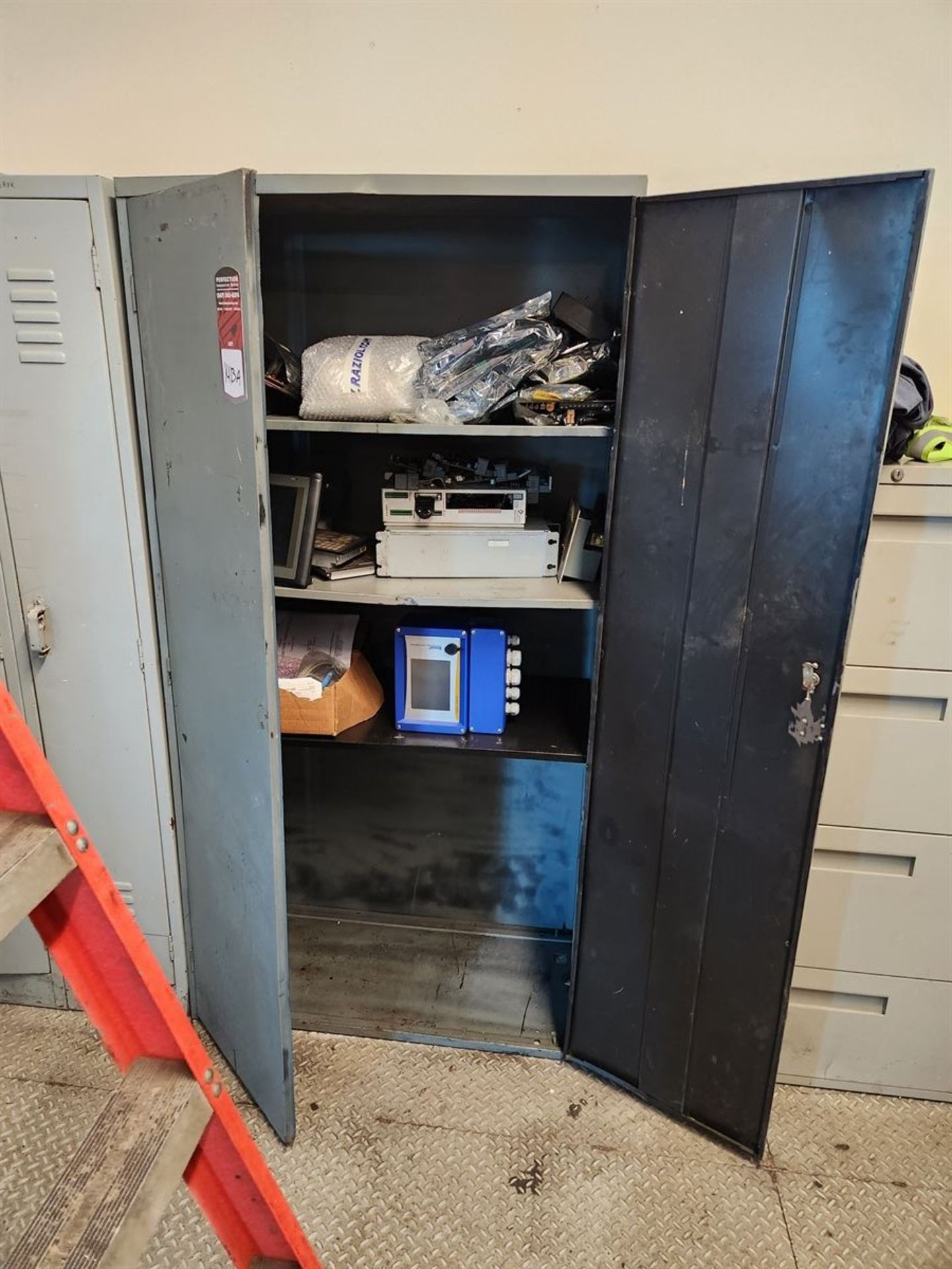 2 Door Cabinet w/ contents