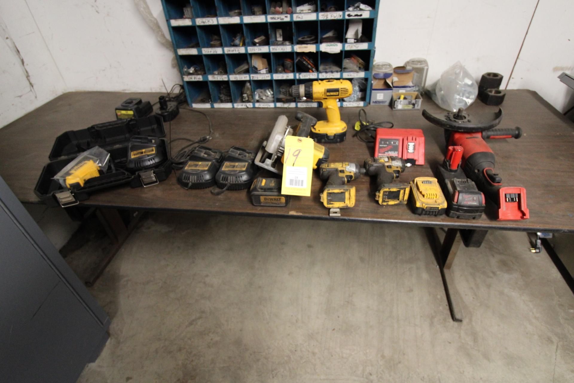 LOT OF BATTERY POWERED TOOLS: (1) Dewalt hand saw, drill, batteries, chargers & Milwaukee grinder,