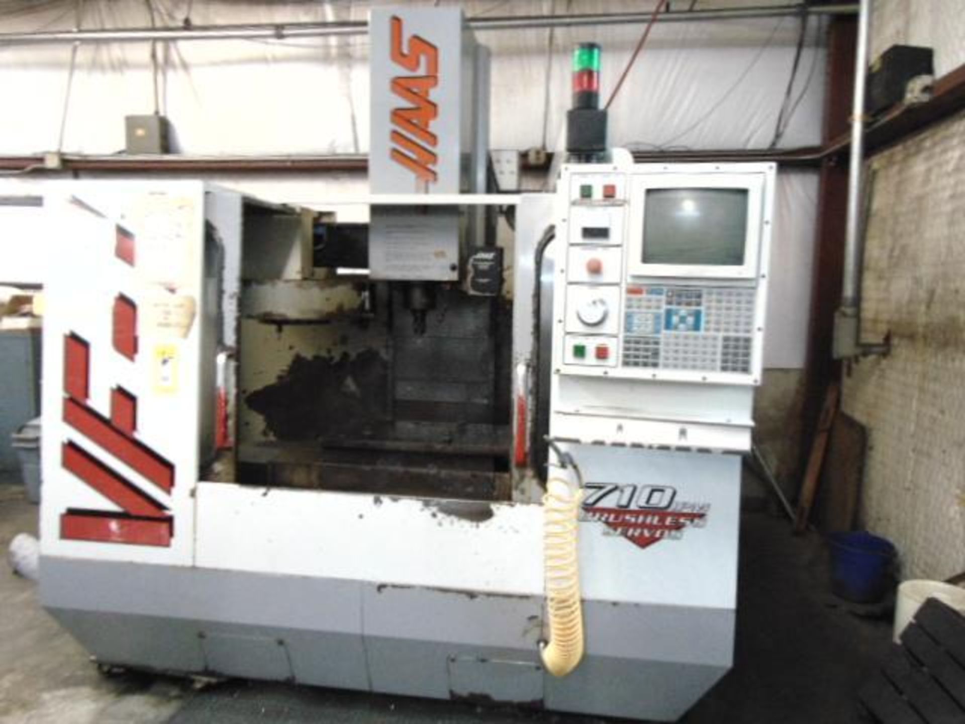 4-AXIS VERTICAL MACHINING CENTER, HAAS MDL. VF1, new 1997, 26" x 14" tbl. size, 20" X, 16" Y, 20" Z-