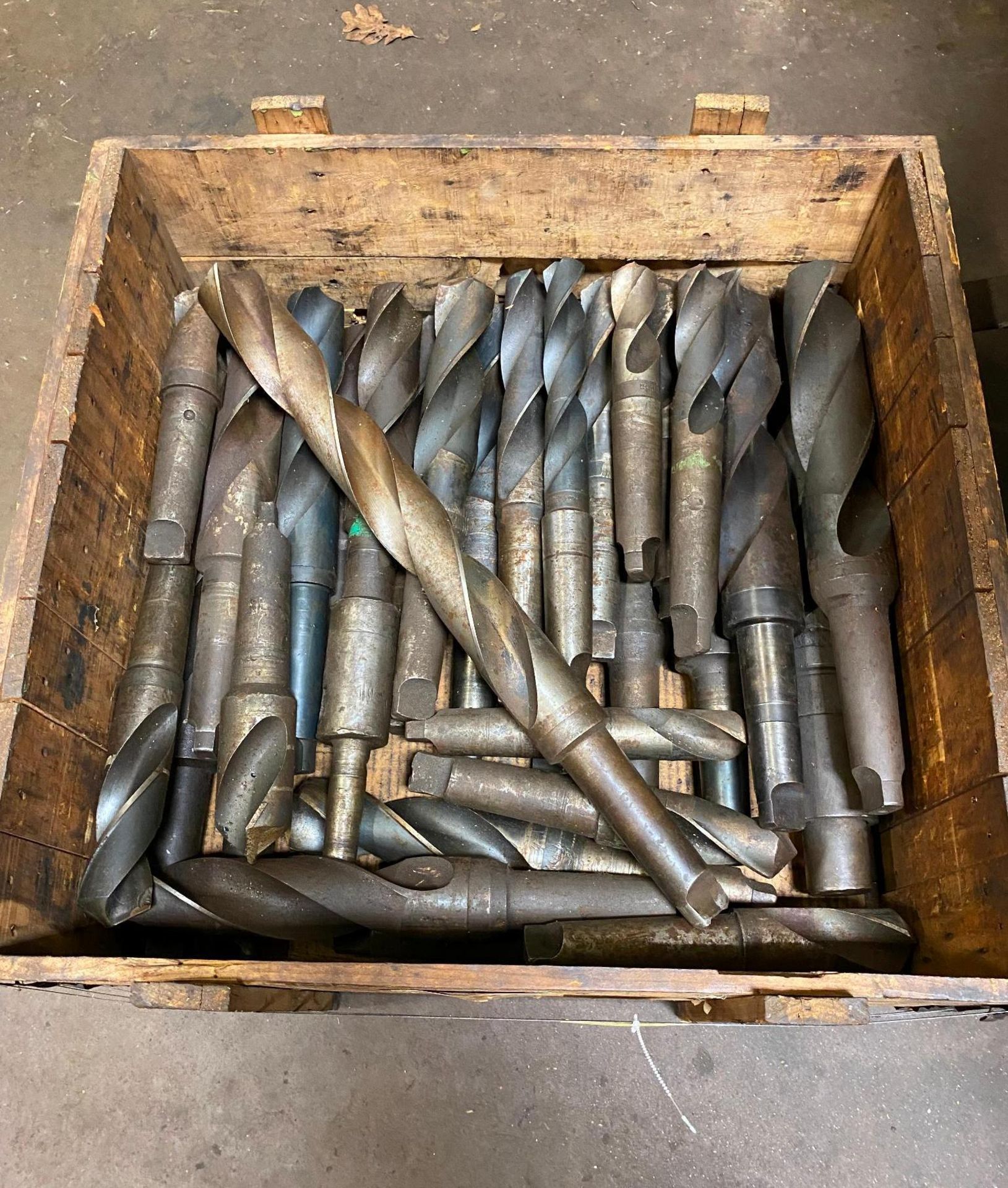 LOT OF TAPER SHANK TWIST DRILLS, in crate (Located at: P & M Machine, Private Road 3463, Gladewater,