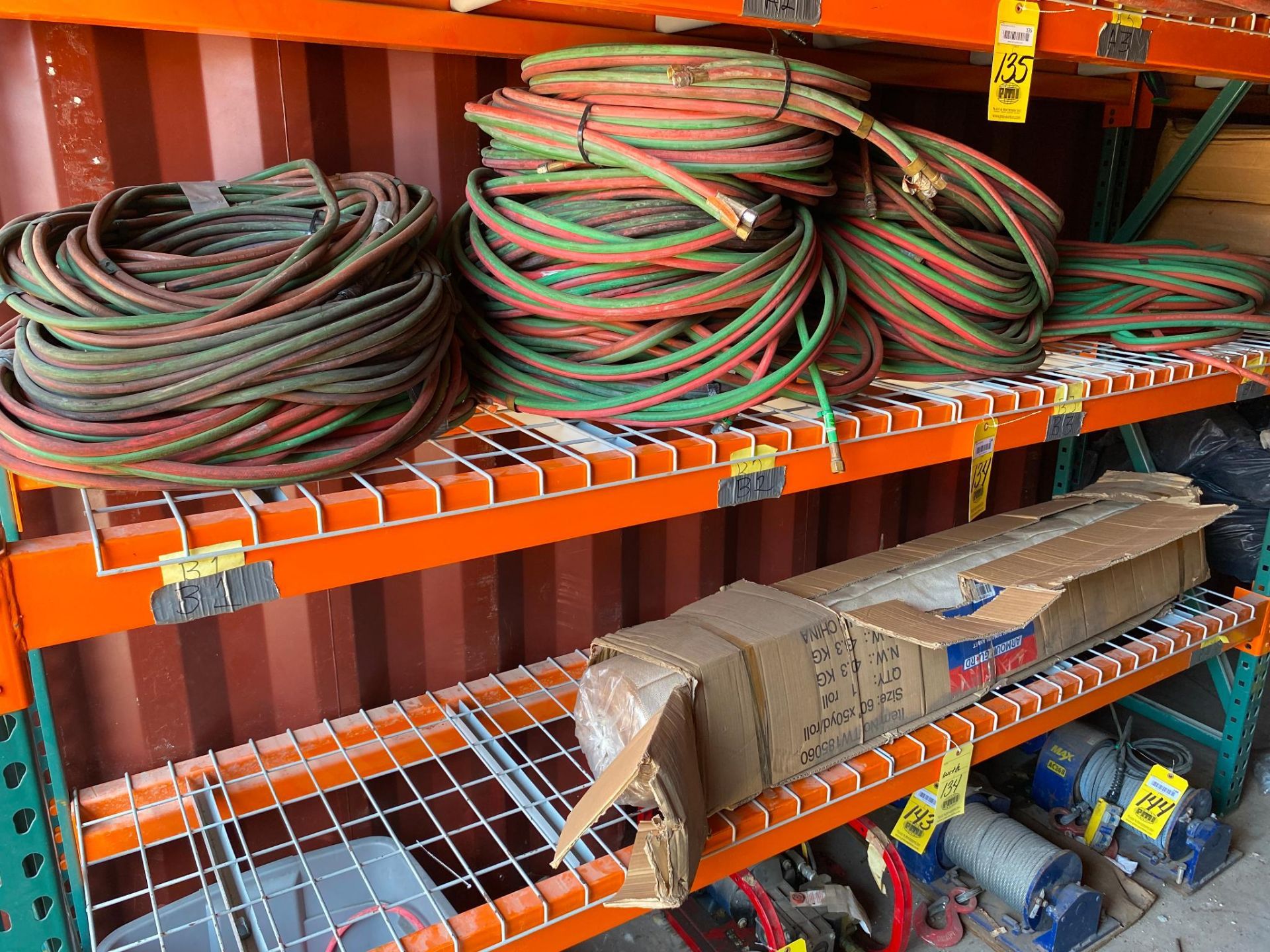 LOT CONSISTING OF: welding blanket, 6" x 50 yards, oxy./ acetylene hose sets, rod holder container,