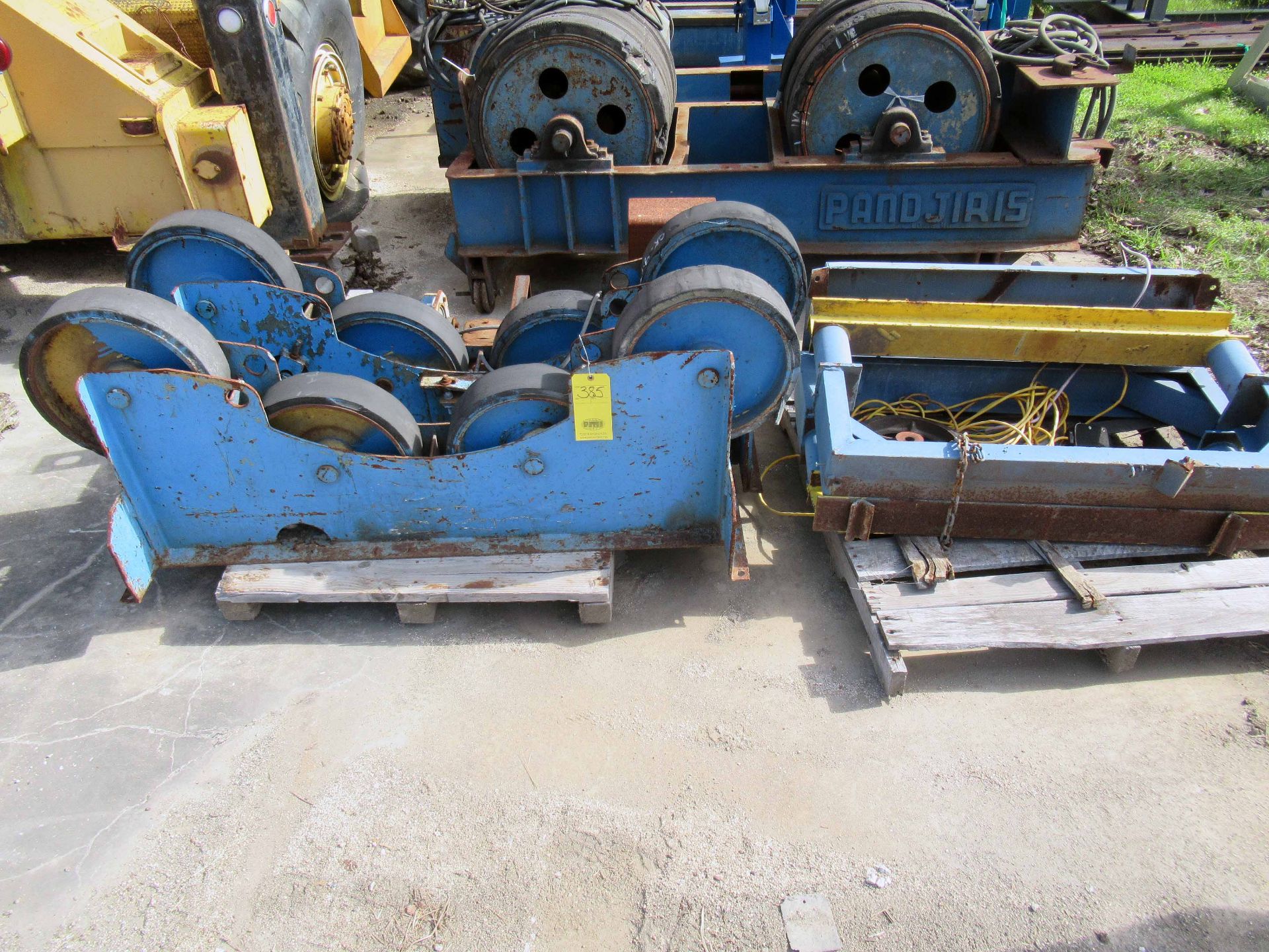 DRIVER & IDLER TANK TURNING ROLL SET, MISSOURI MULE, & small driver next to it (Located at: