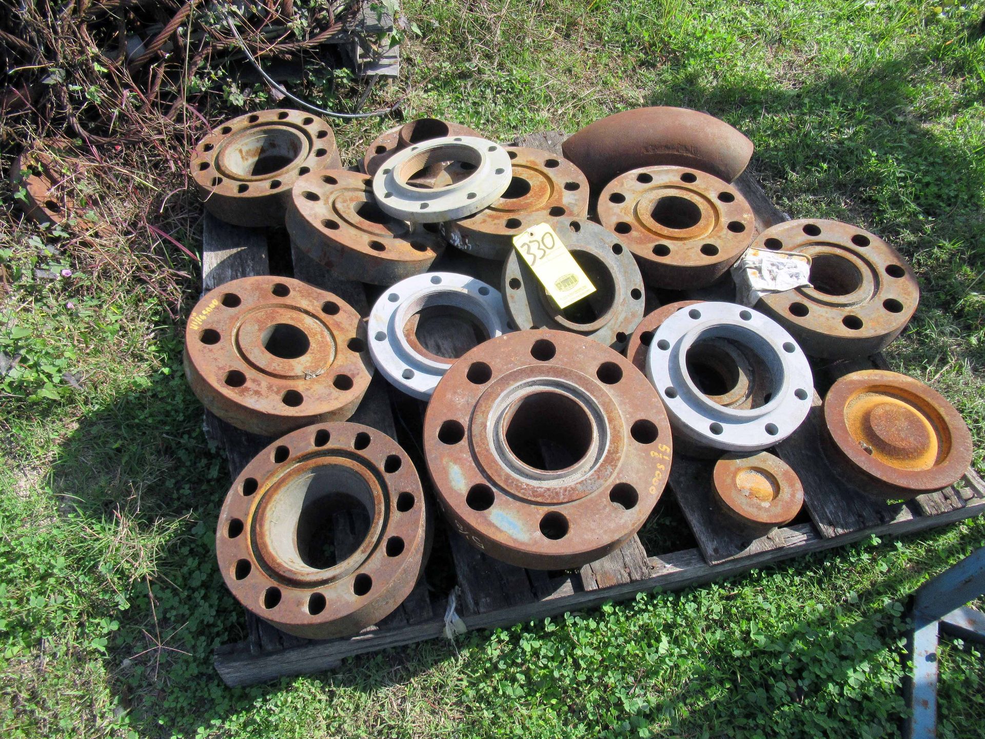 LOT OF ASSORTED SIZED FLANGES, carbon steel (on pallets) (Located at: Precision Welding &