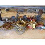 LOT OF ELECTRIC EXTENSION CORDS & LIGHTS (under one table)