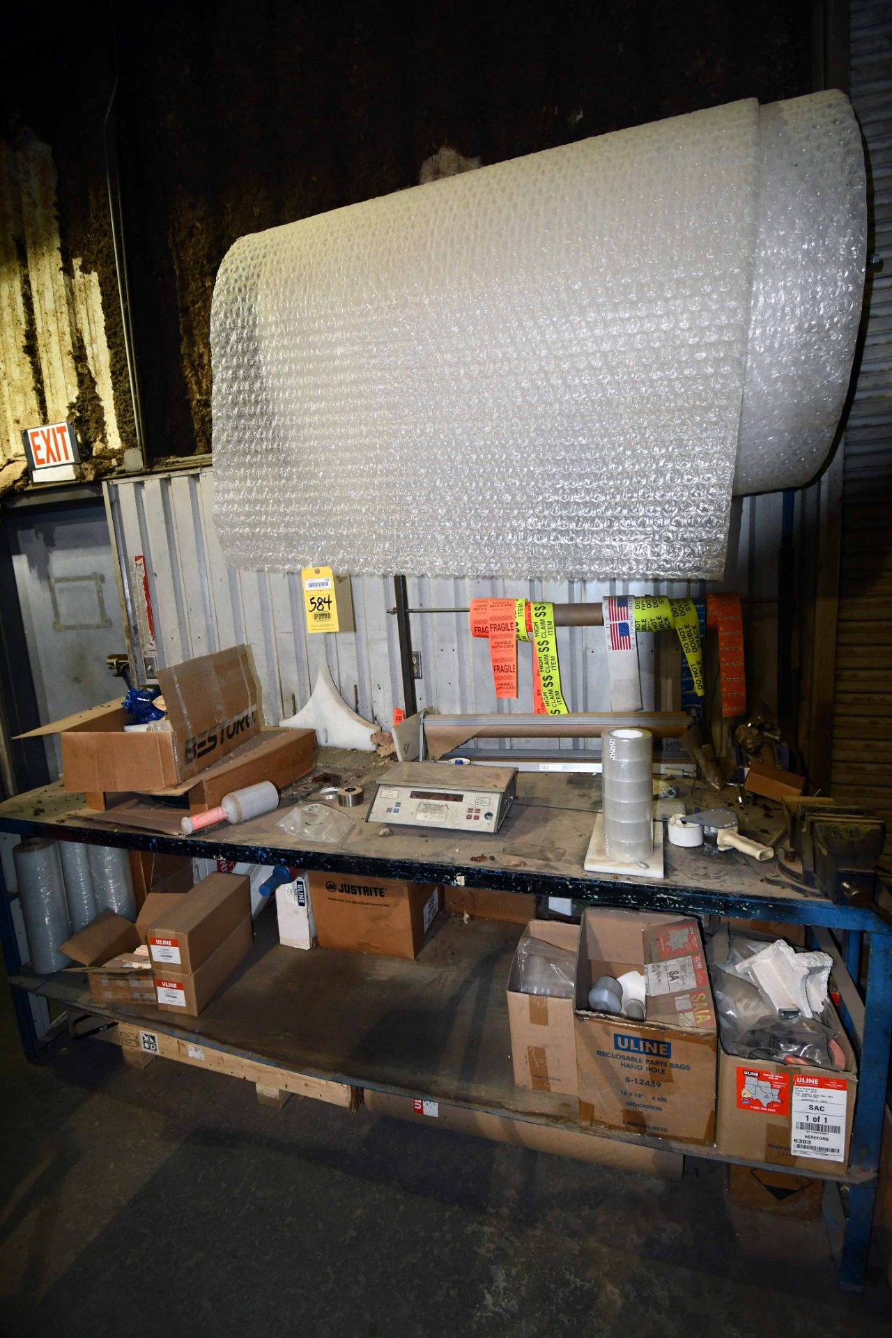 LOT CONSISTING OF: shipping & receiving table, stretch wrap, tape, bags & vise