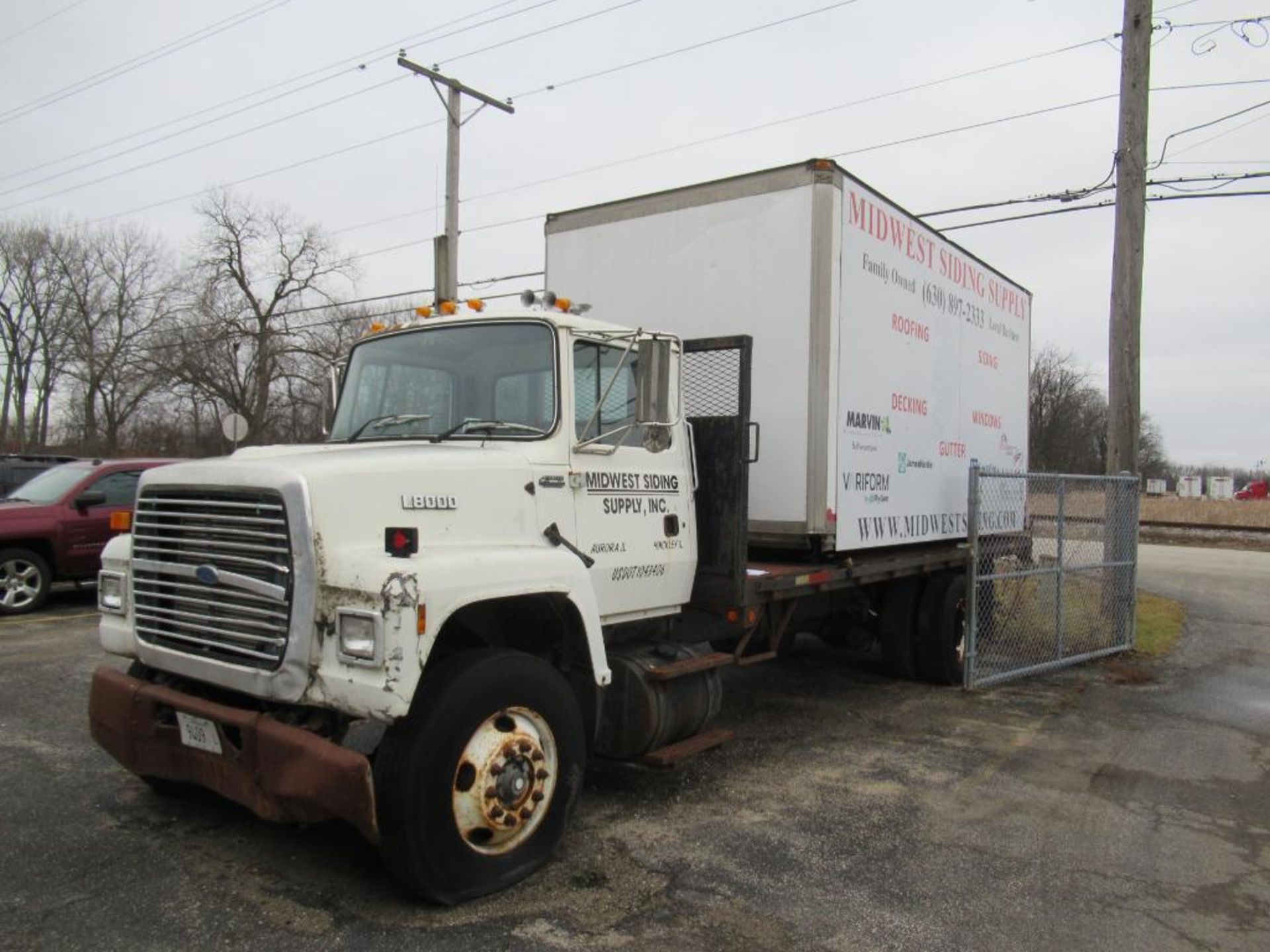 1999 Ford L8000 20 ft. Steel Flatbed Truck VIN 1FDXR82E3SVA37525, 6 Speed Transmission, Single Axle,