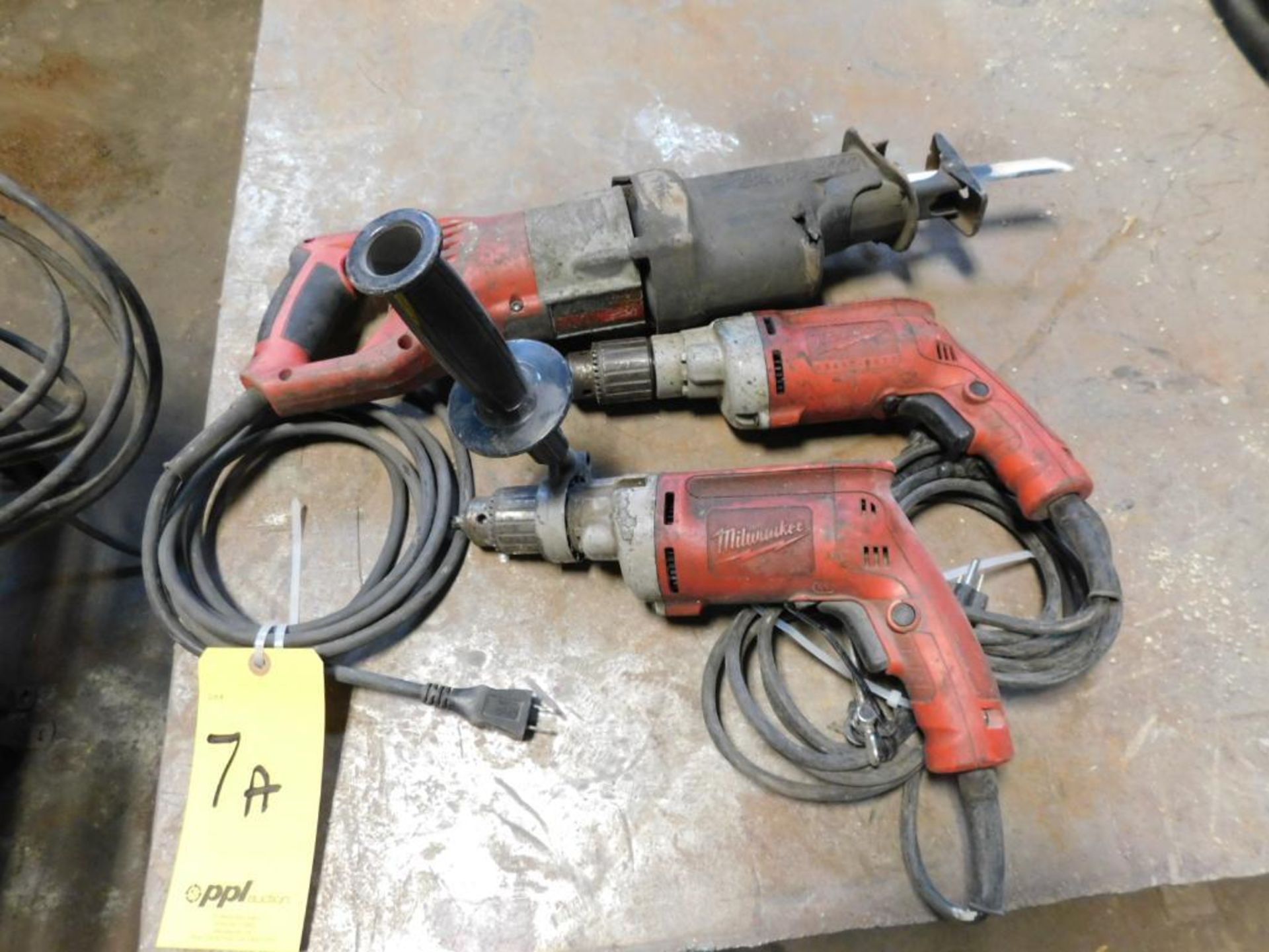 LOT: (1) Milwaukee Sawzall, (2) Milwaukee 1/2" Drills