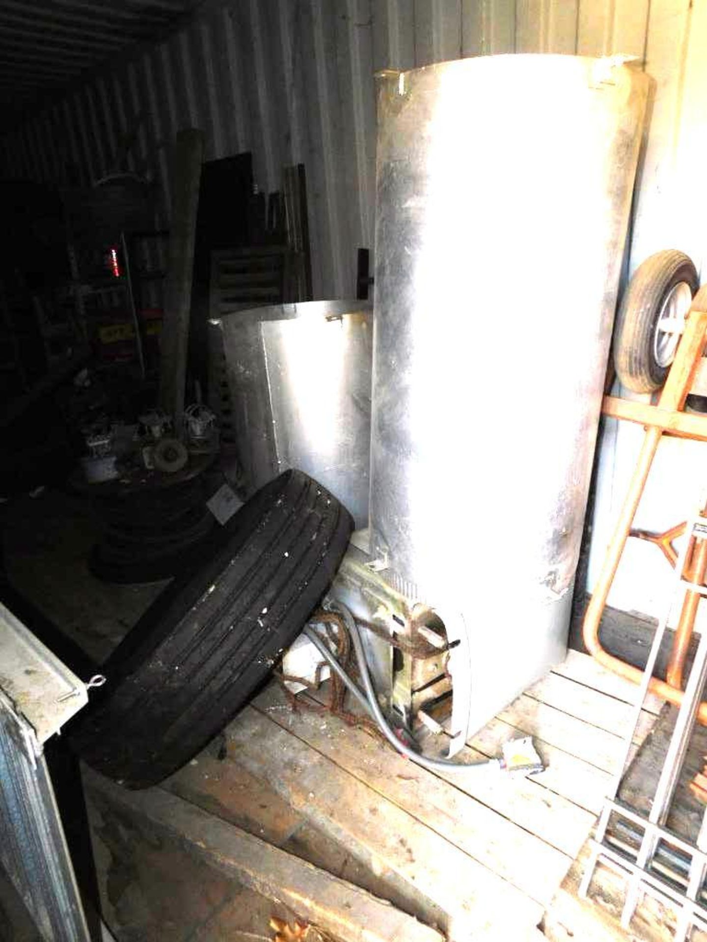 LOT: Contents of Shipping Container: Aluminum Fences, Fan, Material Carts, Aluminum Ramp, Truck Tire - Image 2 of 12