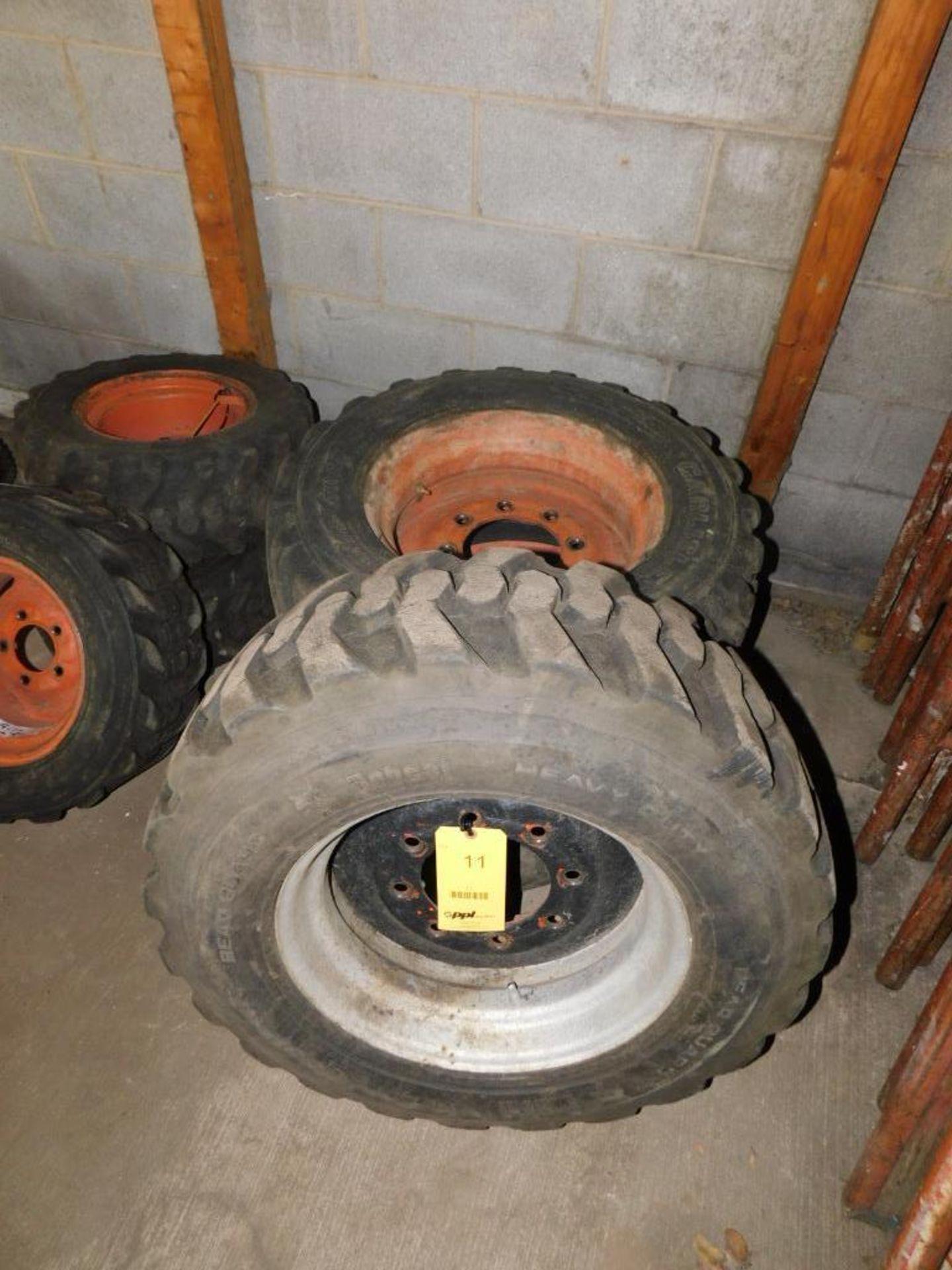 LOT: (1) Bobcat 10-16.5 NHS, (2) Carlisle Trac Chief 10-16.5 NHS Skid Steer Tires