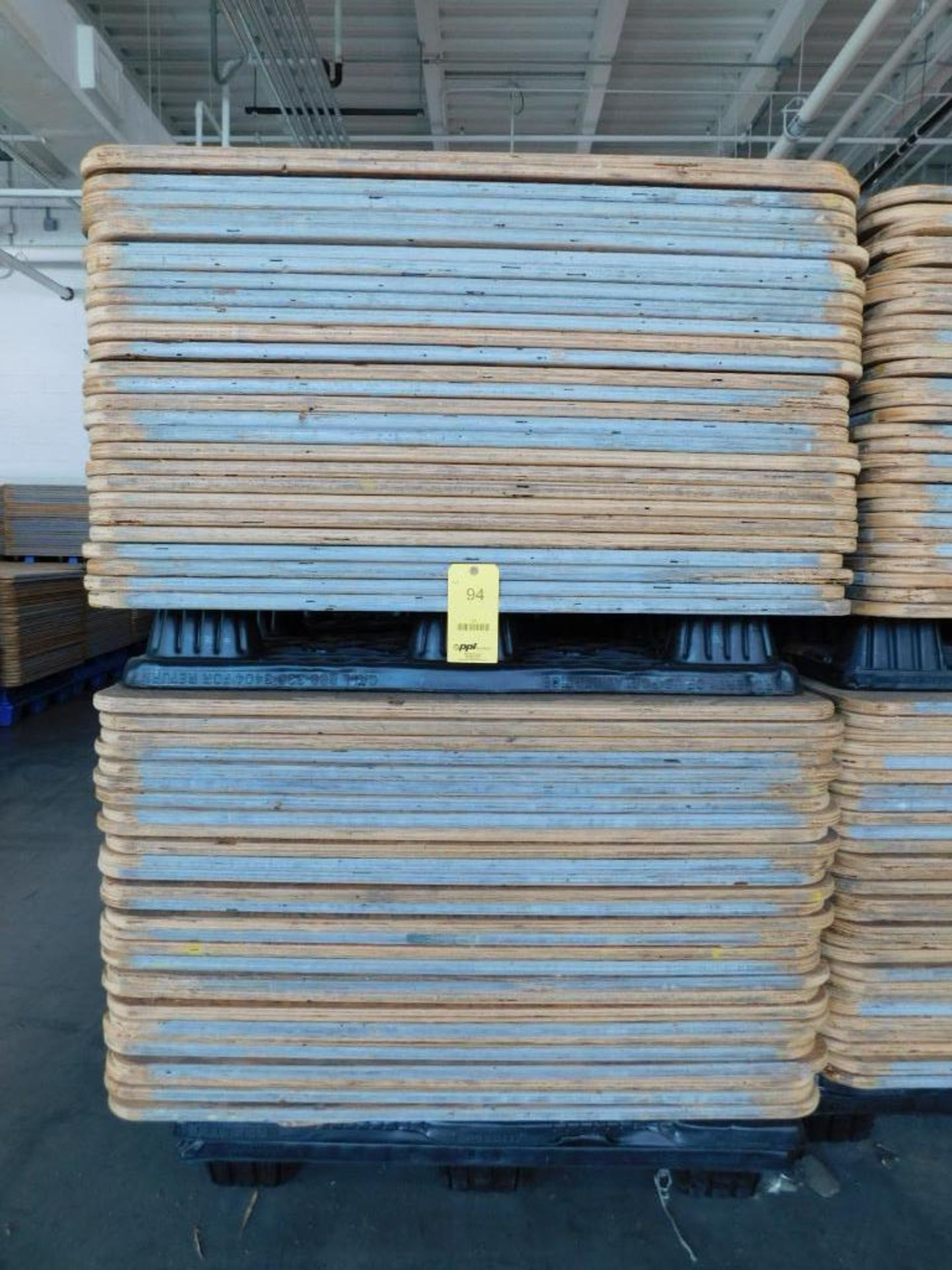 LOT: Large Quantity of 50" x 50" Wood Paper Roll Pallets on (12) Plastic Pallets (LOCATION: IN MAIL