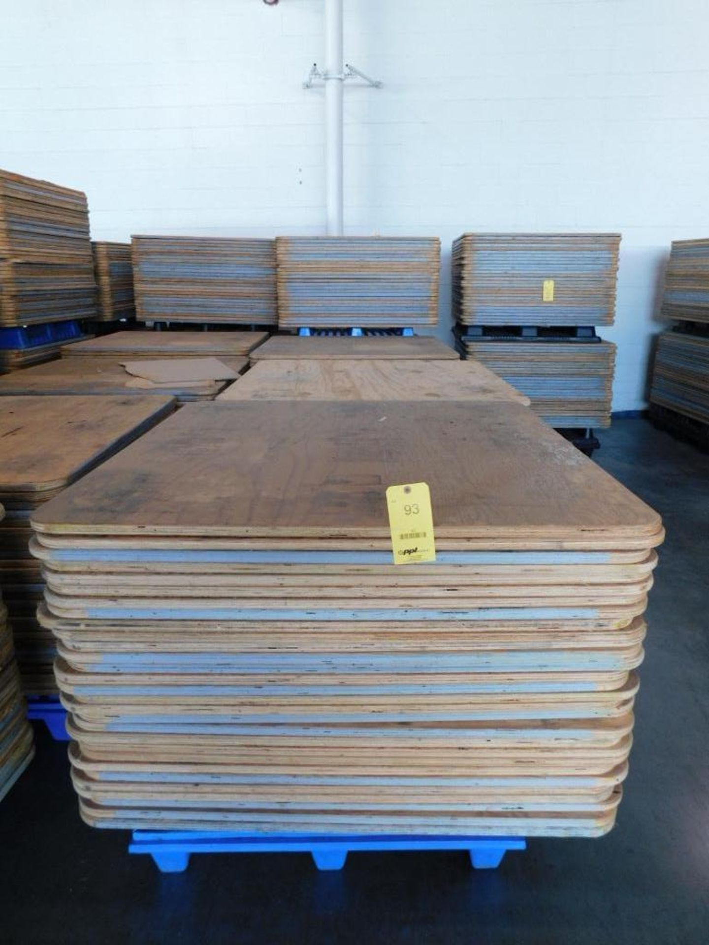 LOT: Large Quantity of 50" x 50" Wood Paper Roll Pallets on (7) Plastic Pallets (LOCATION: IN MAIL R