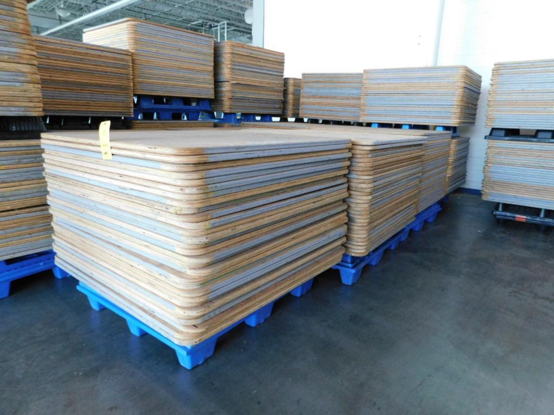 LOT: Large Quantity of 50" x 50" Wood Paper Roll Pallets on (7) Plastic Pallets (LOCATION: IN MAIL R - Image 2 of 6