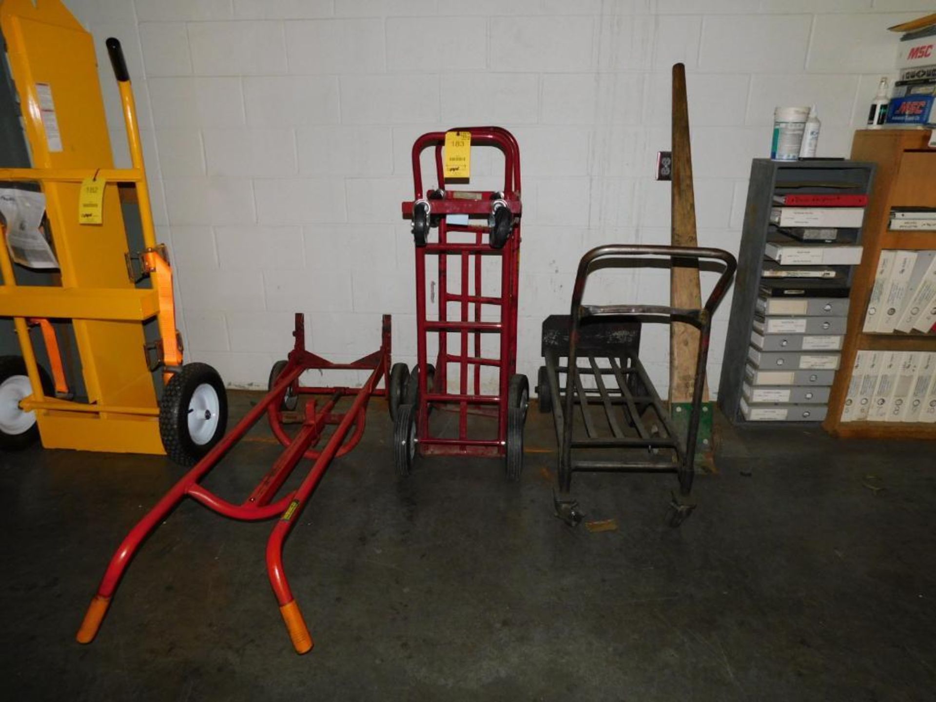 LOT: (3) Convertible Dollies, (1) 5' Johnson Bar, Wesco Drum Barrel Dolly (LOCATION: IN MACHINE SHOP