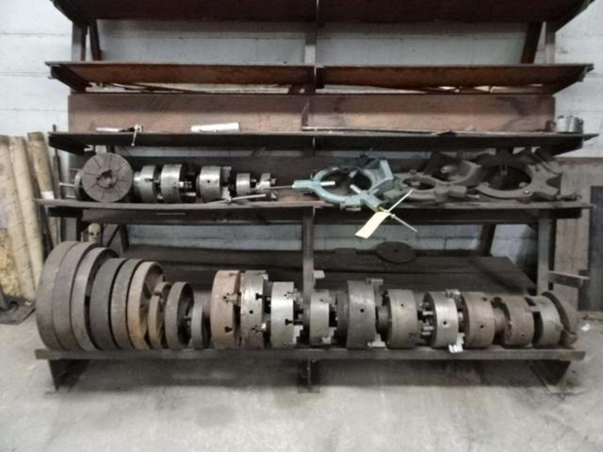 LOT: of Assorted Lathe Rests, Chucks, and Wheel Plates