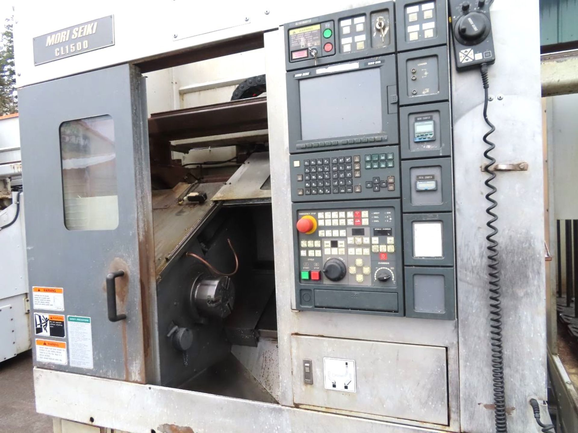 Mori Seiki CL-1500 CNC Chucking Lathe with Robotic Load/unloader and Parts Stocker New 2002, - Image 15 of 21