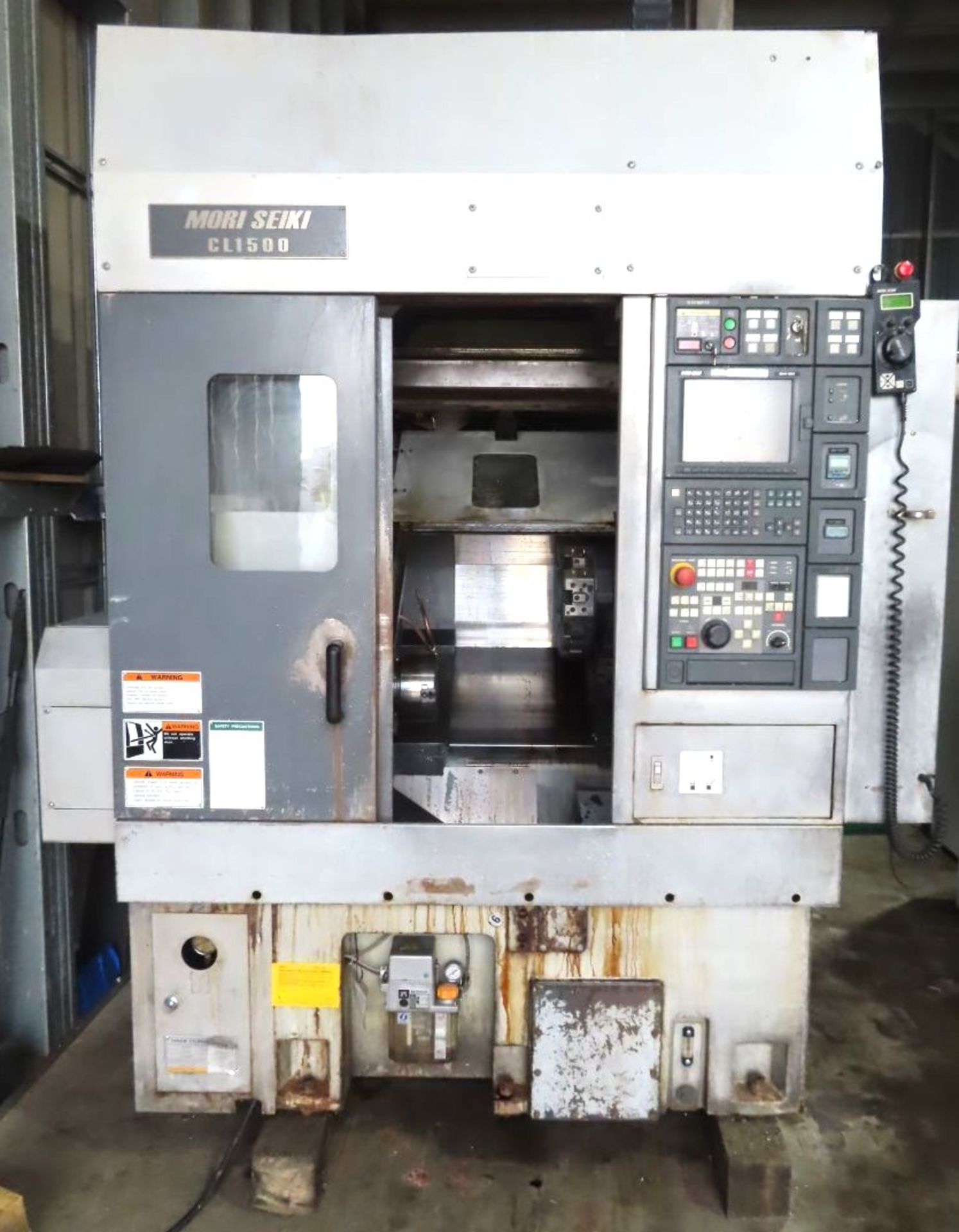 Mori Seiki CL-1500 CNC Chucking Lathe with Robotic Load/unloader and Parts Stocker New 2002,
