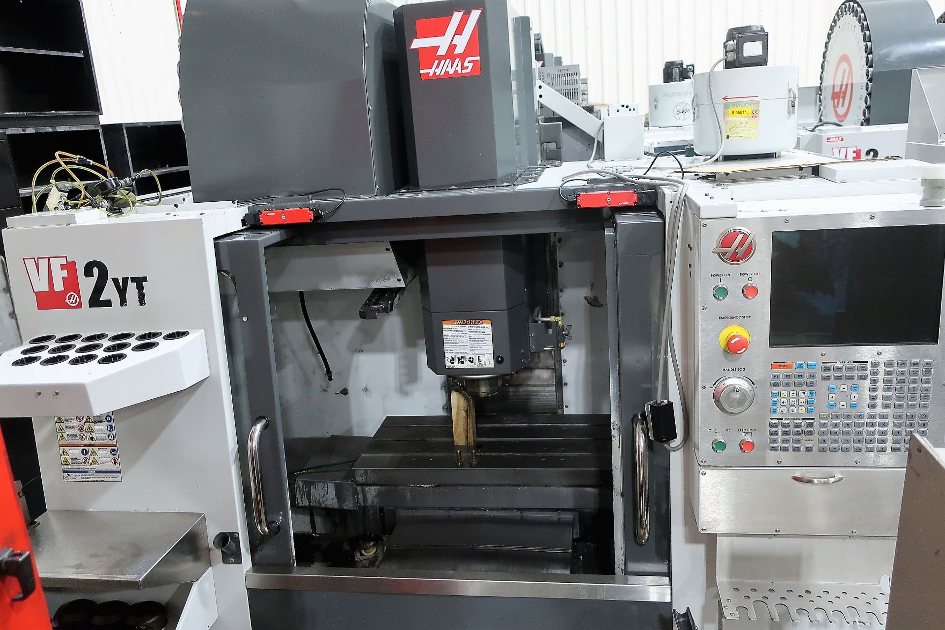 HAAS VF2-YT CNC 3-AXIS VERTICAL MACHINING CENTER, 15,000 RPM SPINDLE, S/N 1102152, NEW 2014