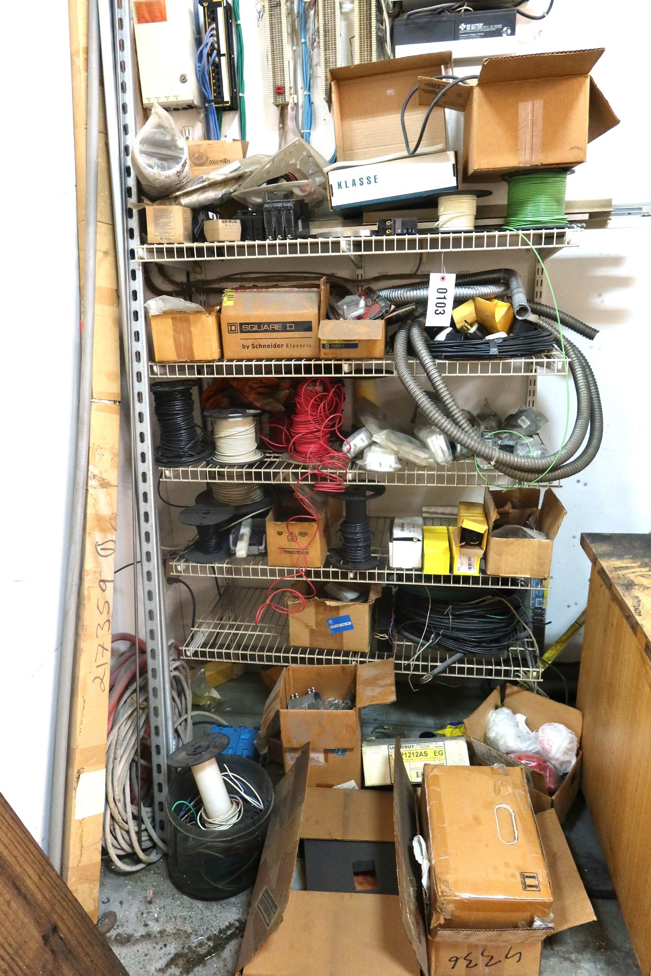 Rack of Electric Supplies, Plumping Supplies, and Wiring