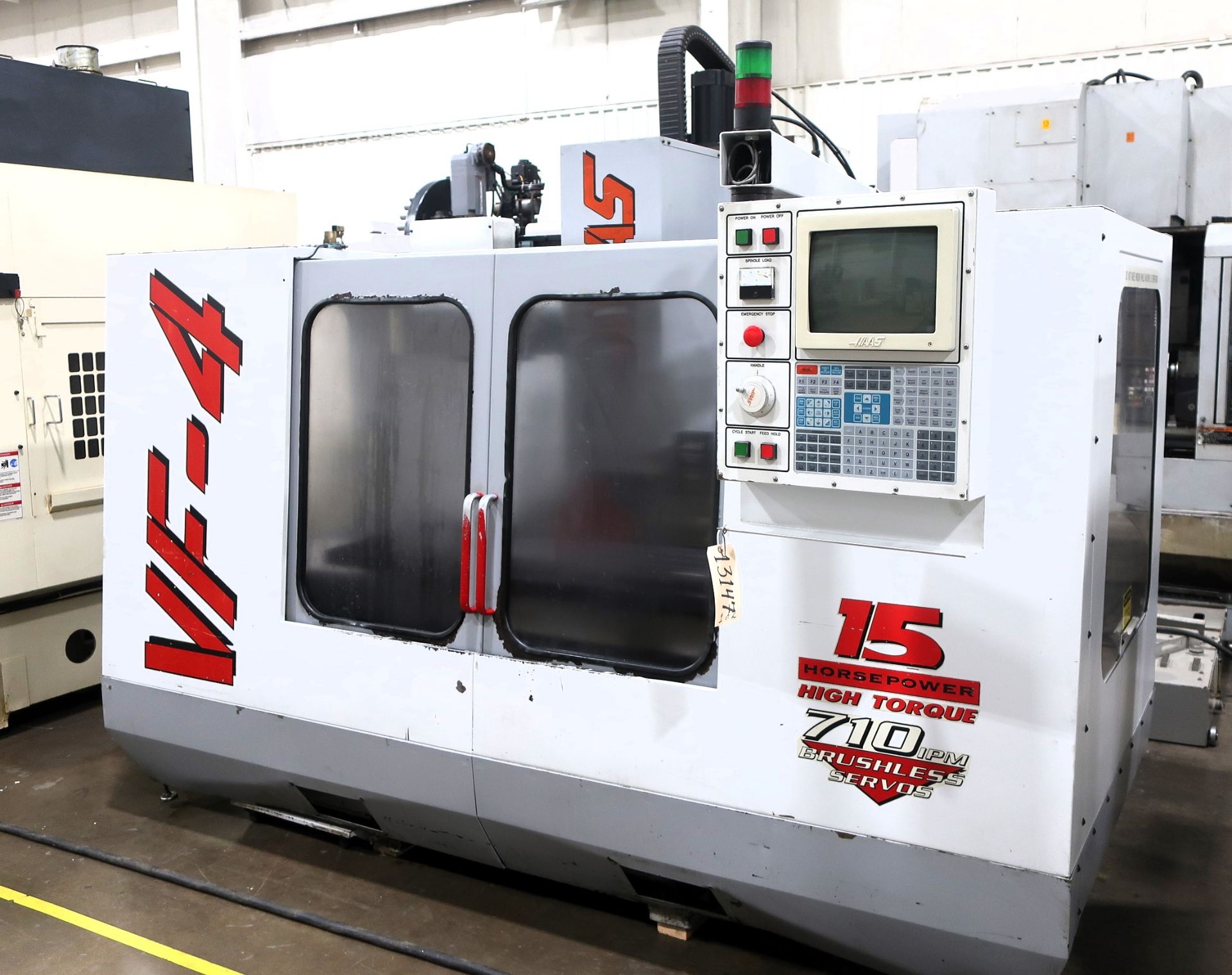 HAAS VF-4 CNC VERTICAL MACHINING CENTER, S/N 7443, NEW 1996