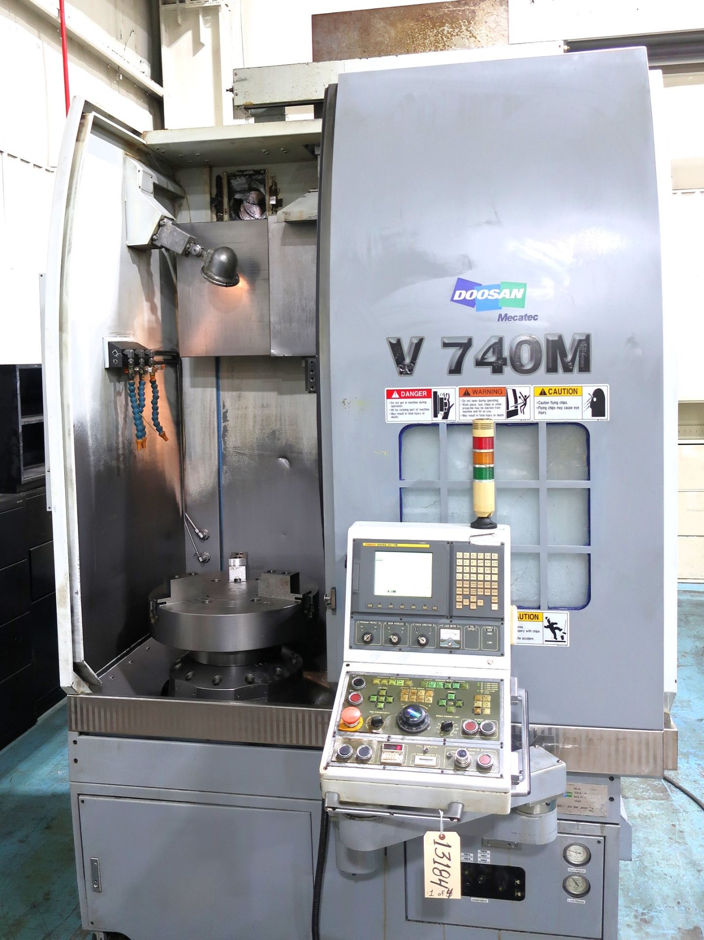 2006 24" Doosan V740M 3-Axis CNC Vertical Turning Center w/live tooling and C-axis, S/N 1013