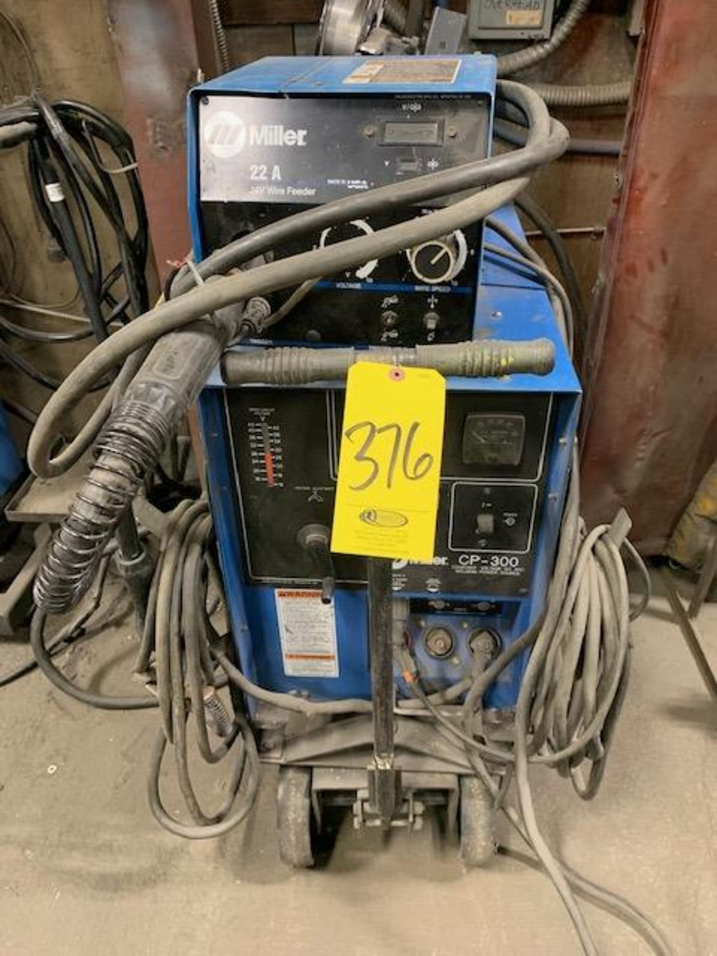 MILLER CP-300 CV DC ARC WELDER, S/N KA797640 W/ 22A 24V WIRE FEEDER, S/N LC049735 W/ STEERABLE...