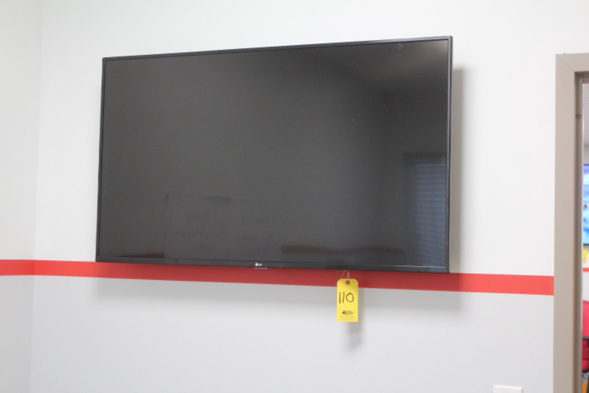 LG 50 IN. FLATSCREEN TV WITH REMOTE AND WALL MOUNT